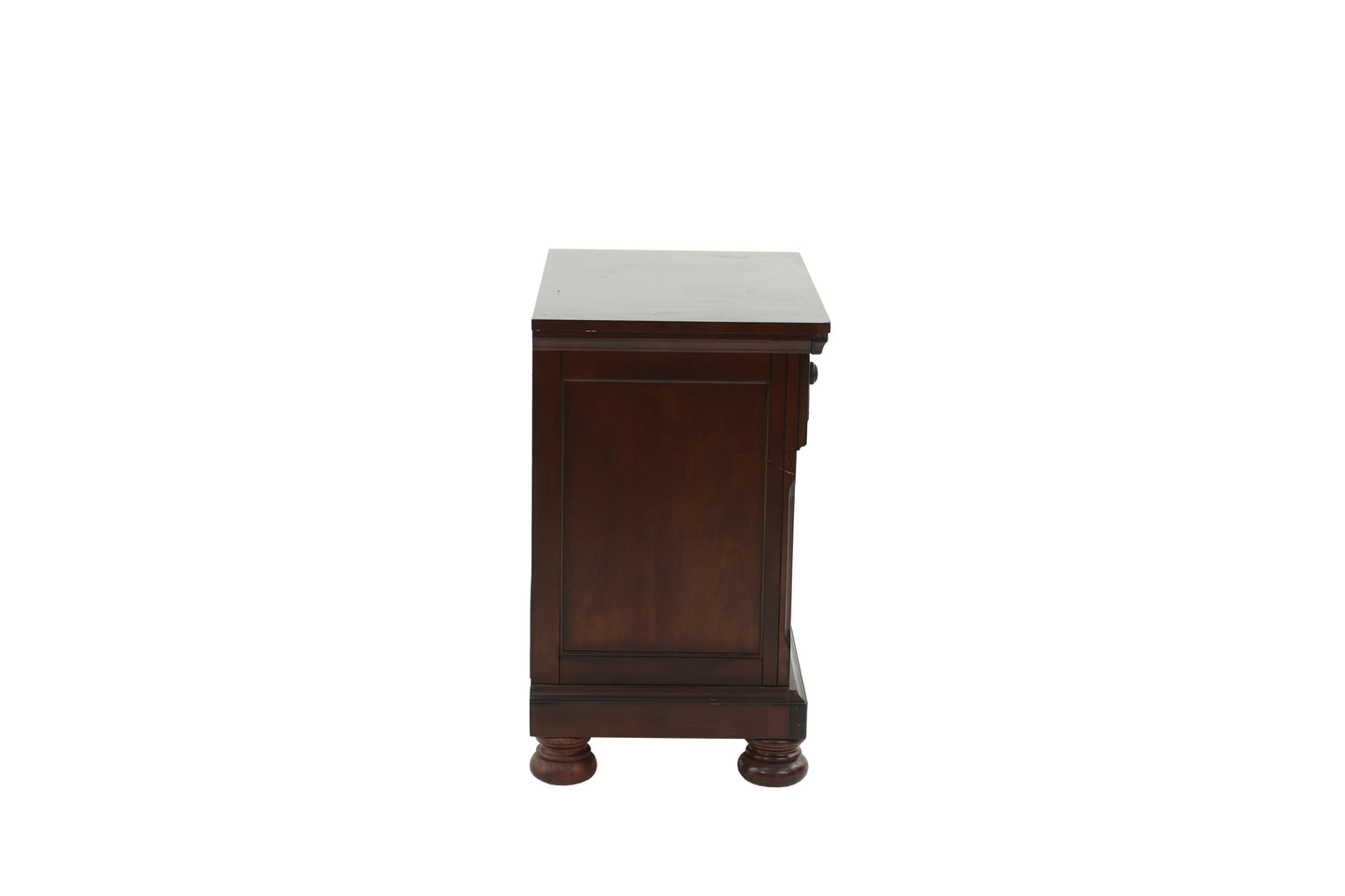 Dark wood dresser with decorative trim and turned feet side view