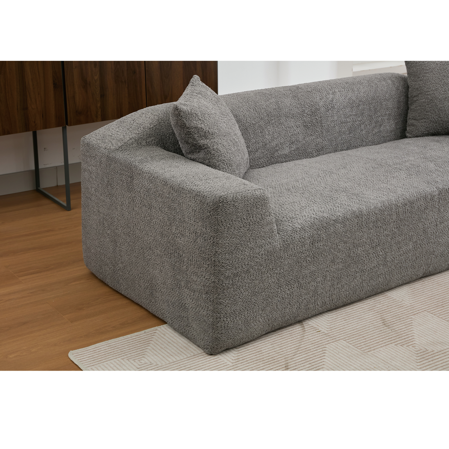 Plush grey sectional sofa with boucle fabric and a modern design for living room comfort