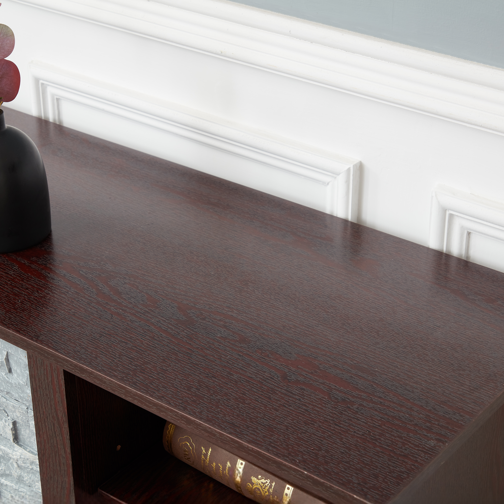 Dark brown wood grain console table surface with decorative trim molding