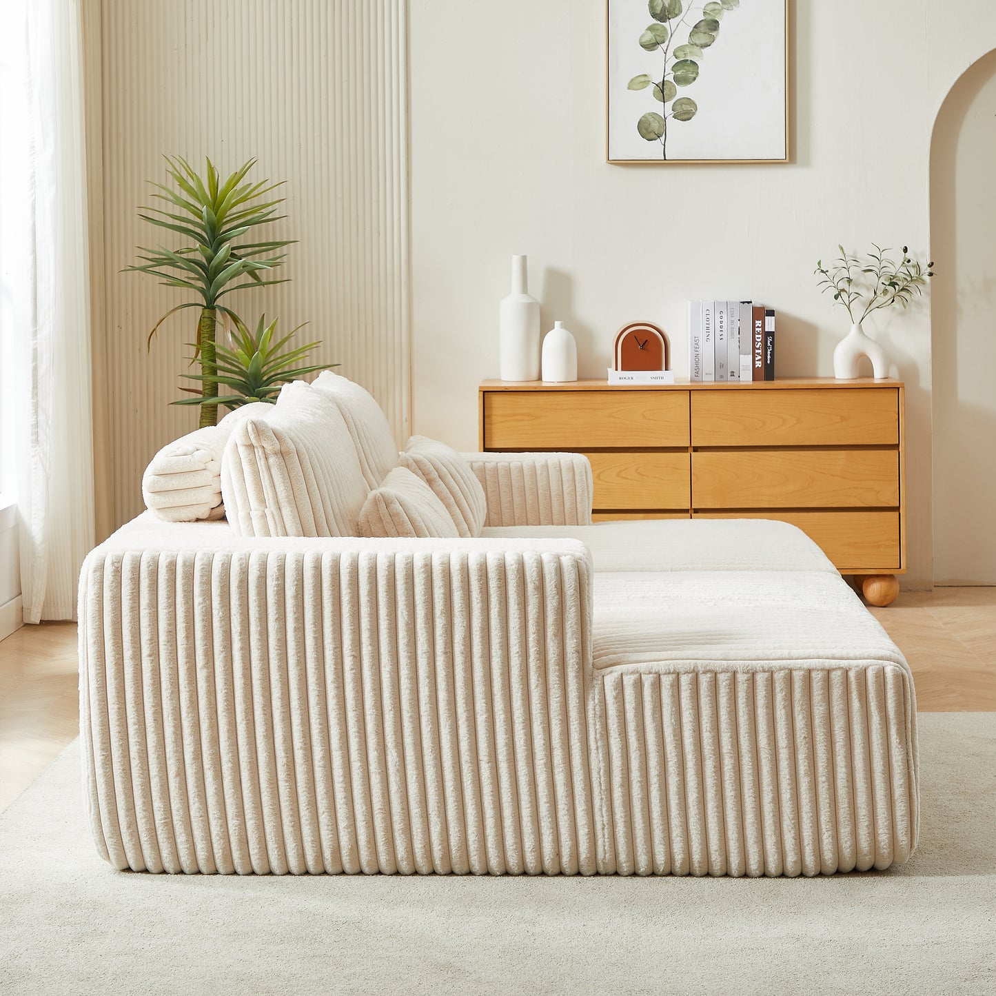 Beige corduroy sectional sofa with plush cushions perfect for a modern living room