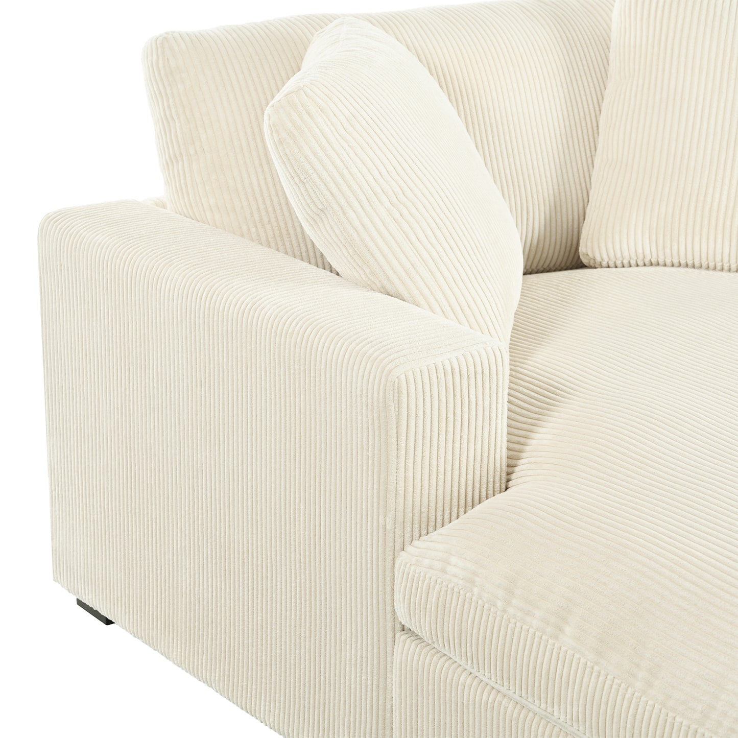 Cream corduroy sectional sofa with plush throw pillows on white background