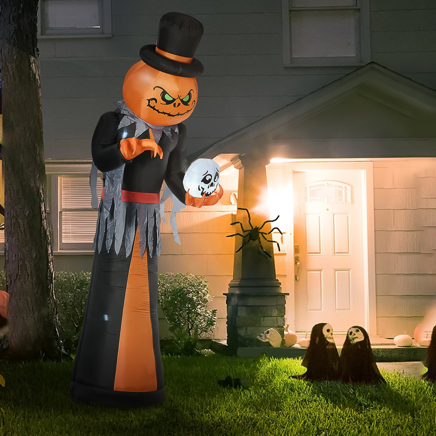 Giant inflatable Jackolantern figure in black suit holding a skull