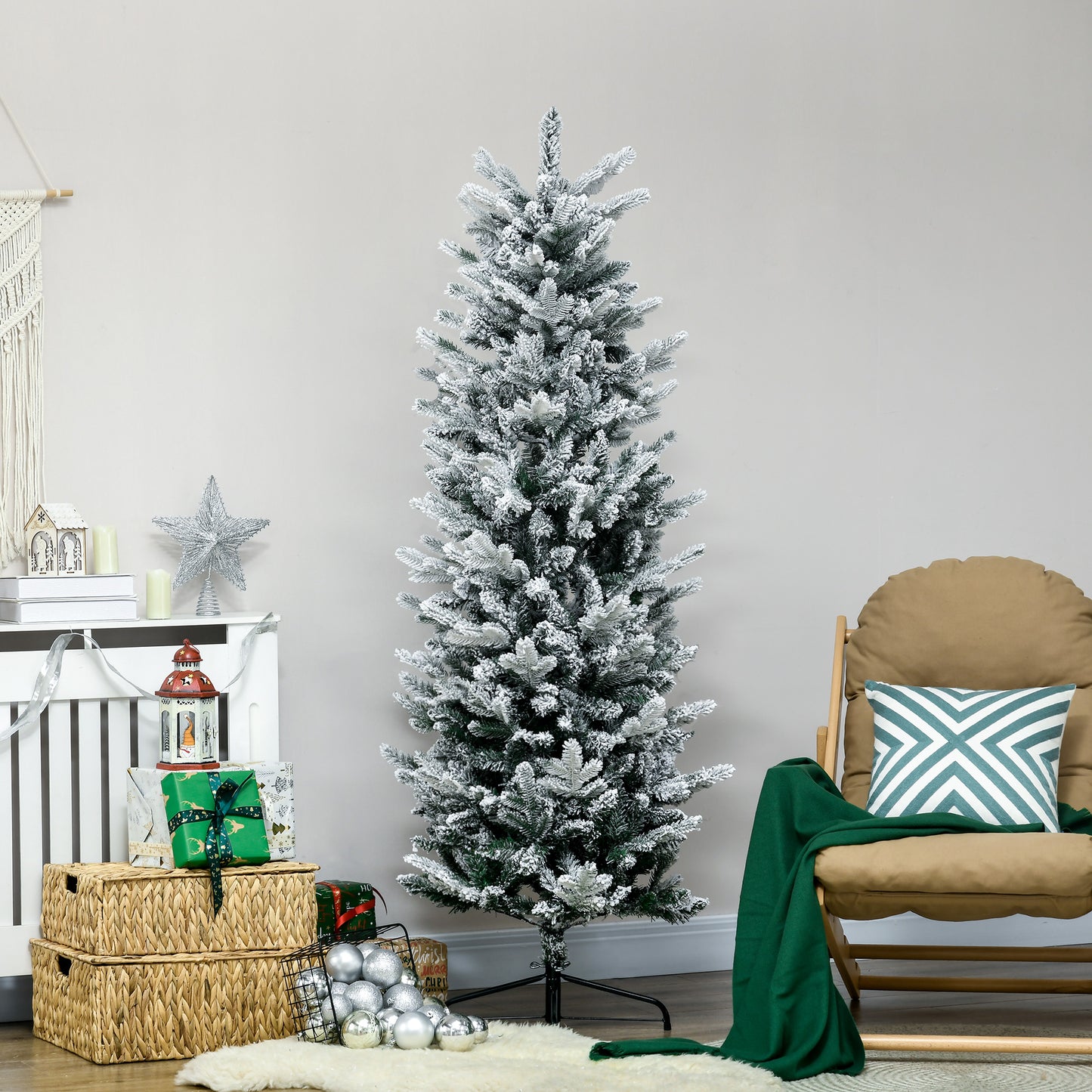 Flocked artificial Christmas tree with realistic PVC needles and a snowy effect