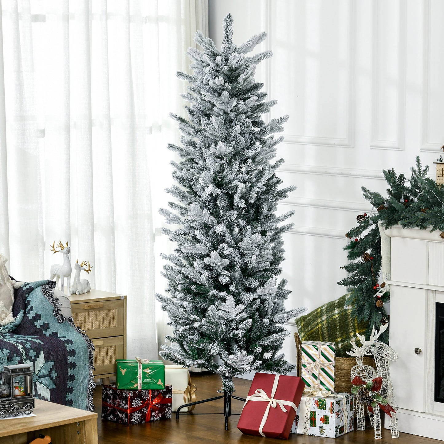 Flocked artificial Christmas tree with realistic snowy branches ideal for festive decor