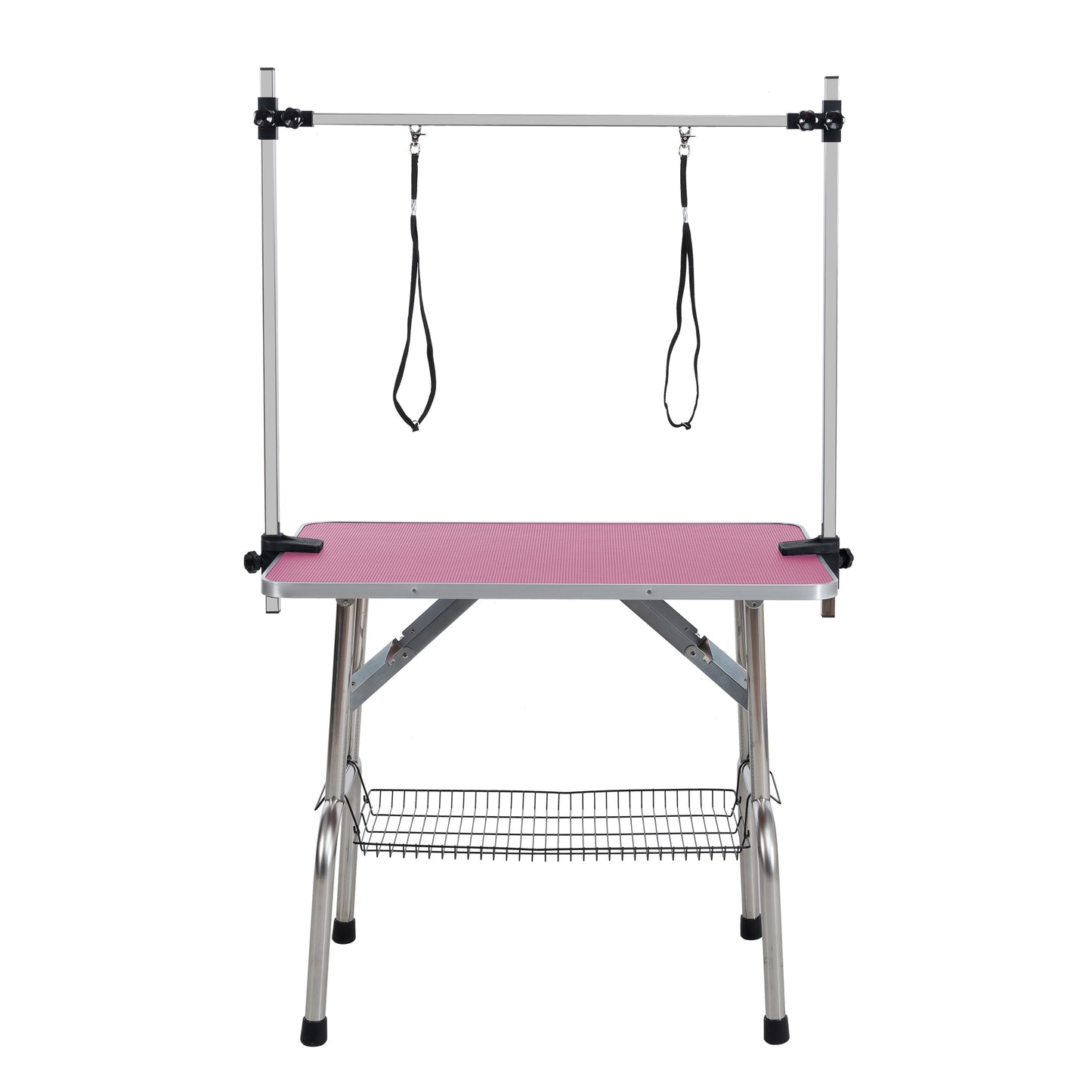 Adjustable grooming table with pink textured surface and metal frame including adjustable restraints and wire basket