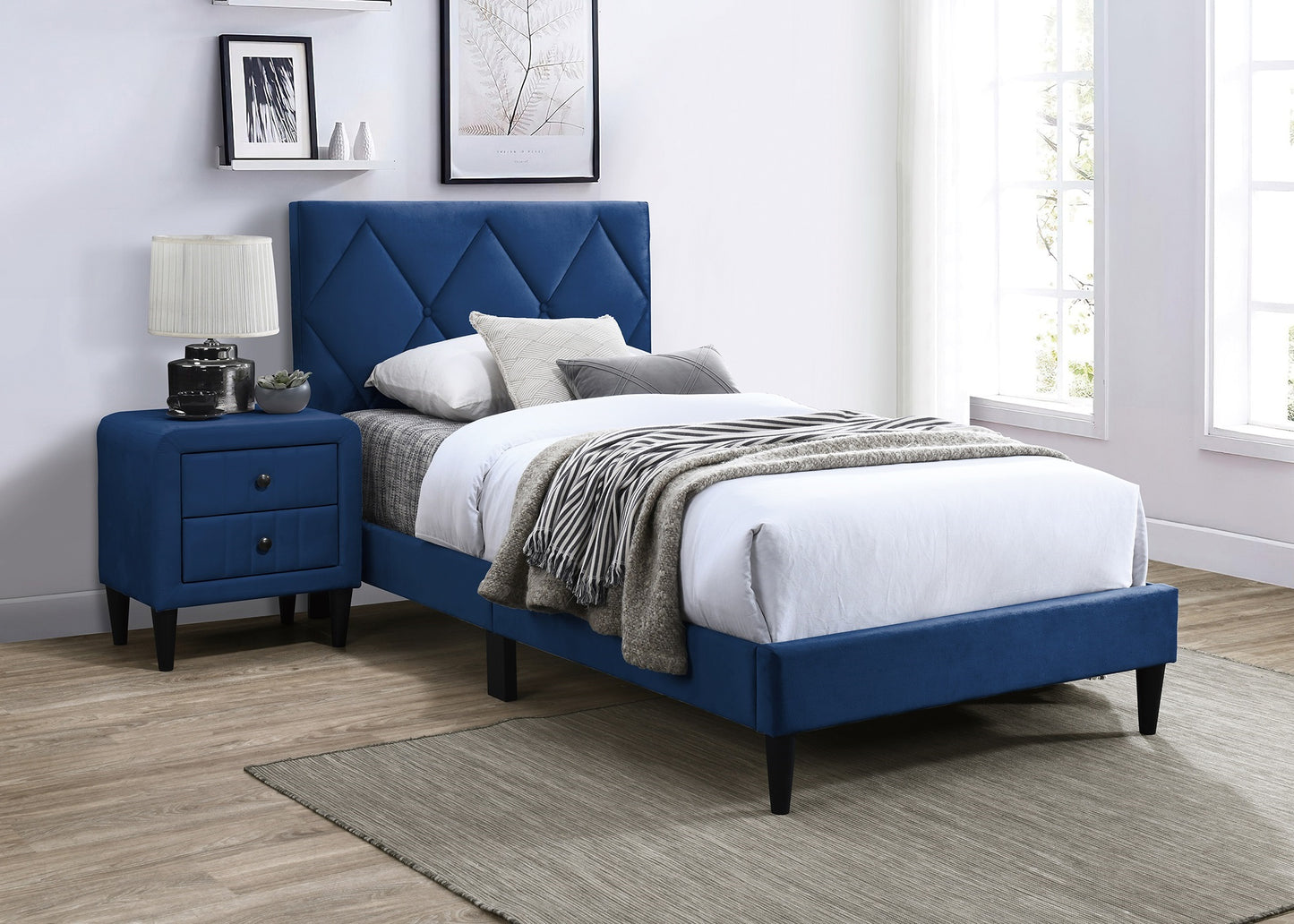 Royal blue upholstered twin bed with diamond tufted headboard