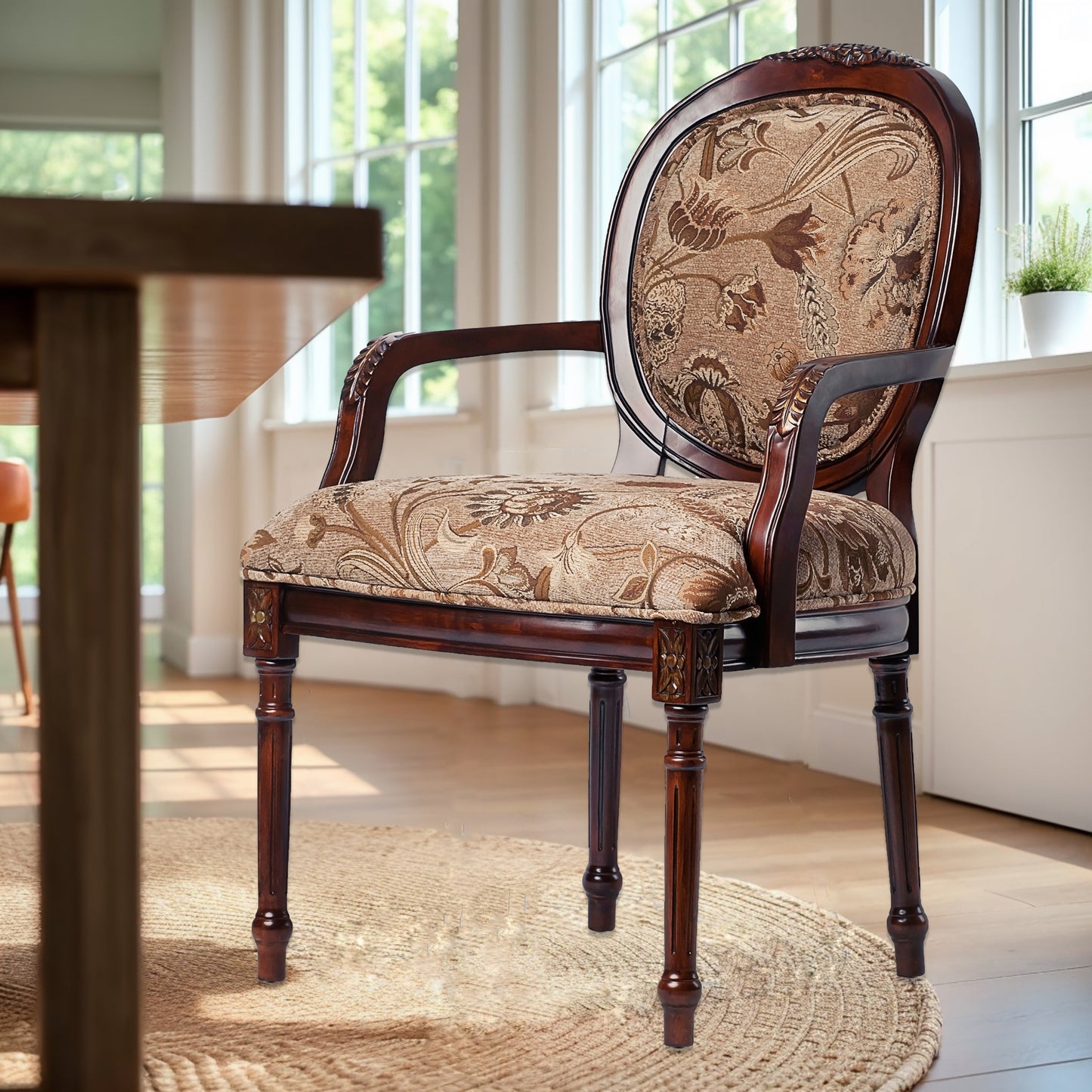 Elegant antique accent chair with carved dark wood frame and ornate floral upholstery