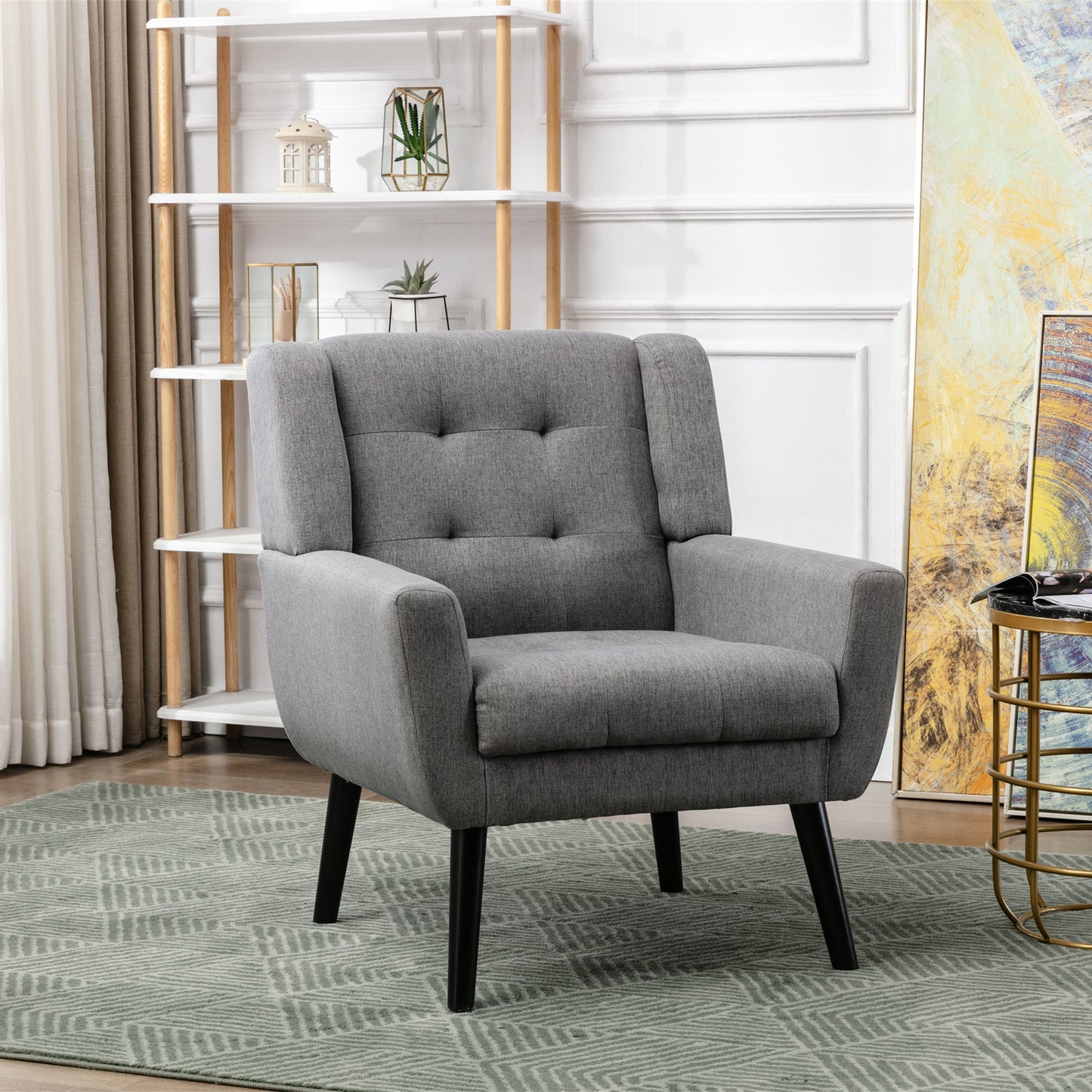 Tufted grey fabric accent chair with black tapered legs a stylish armchair