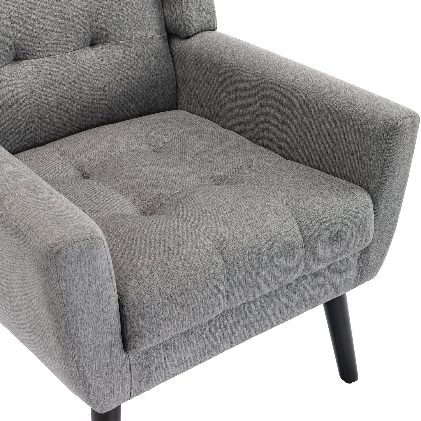 Tufted grey fabric accent chair with black tapered legs