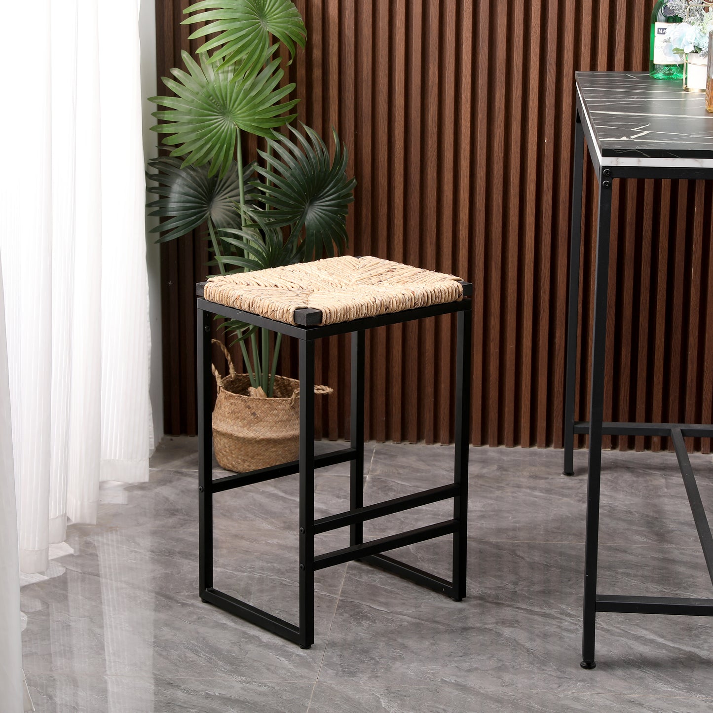 Square woven stool with natural rattan seat and black metal frame