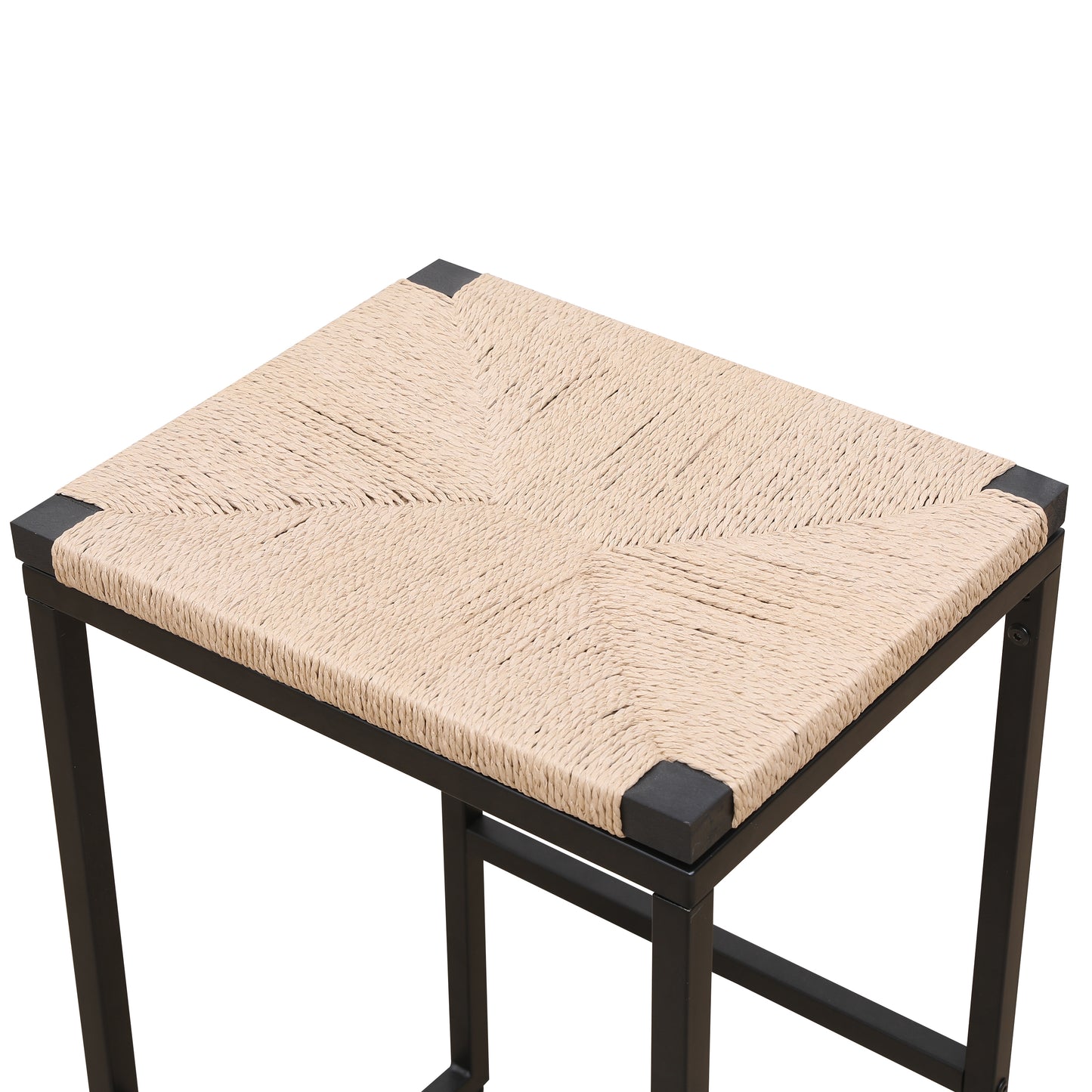 Closeup of a natural woven straw seat with a black metal frame bar stool
