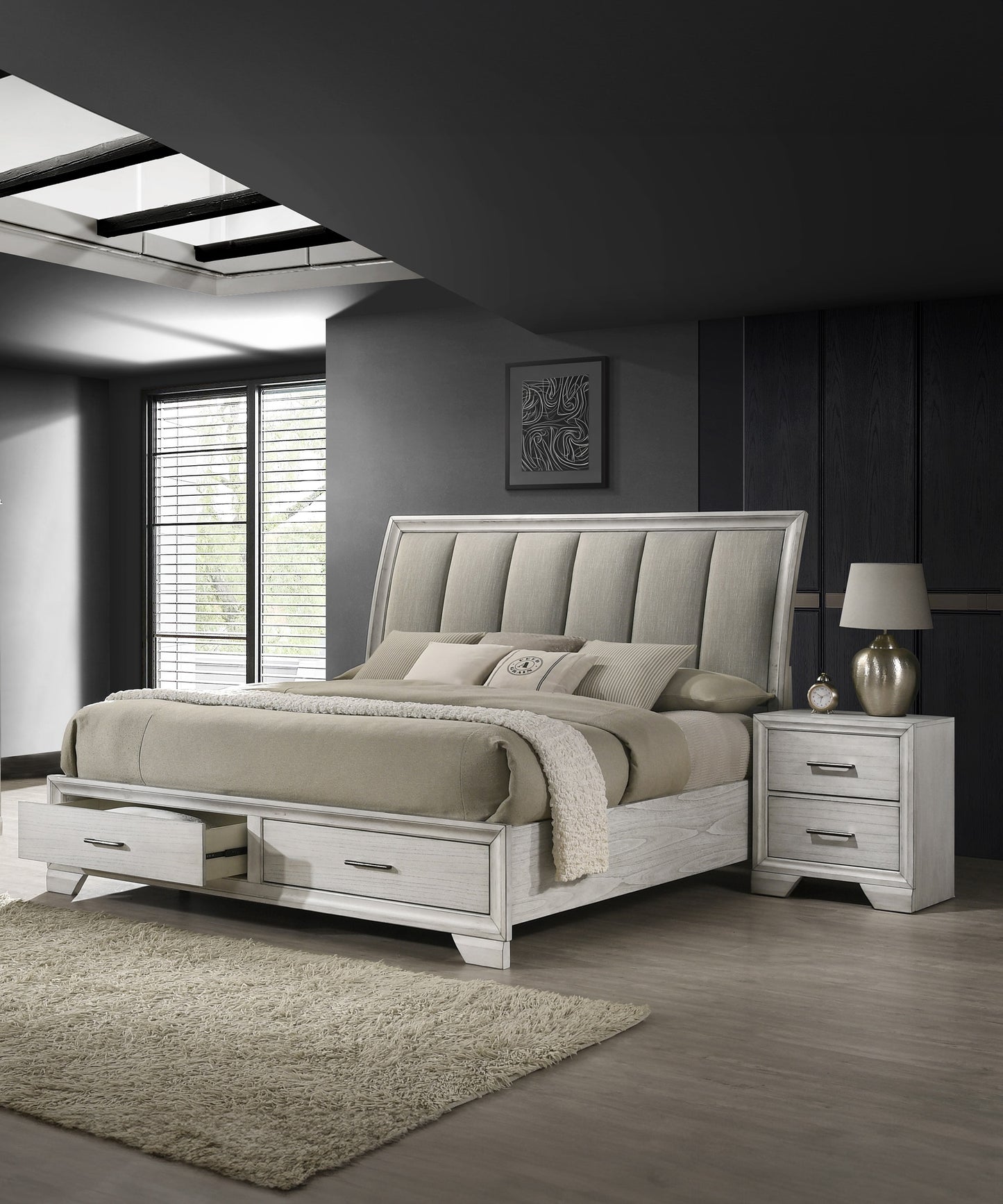 Gray upholstered platform bed with storage drawers and a tufted headboard