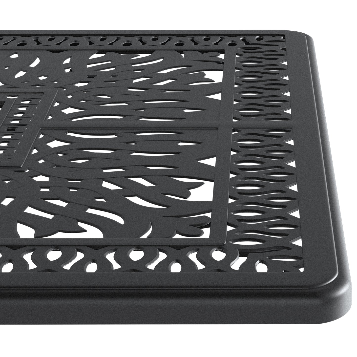 Closeup of a black ornate cast iron table top with intricate leaf pattern
