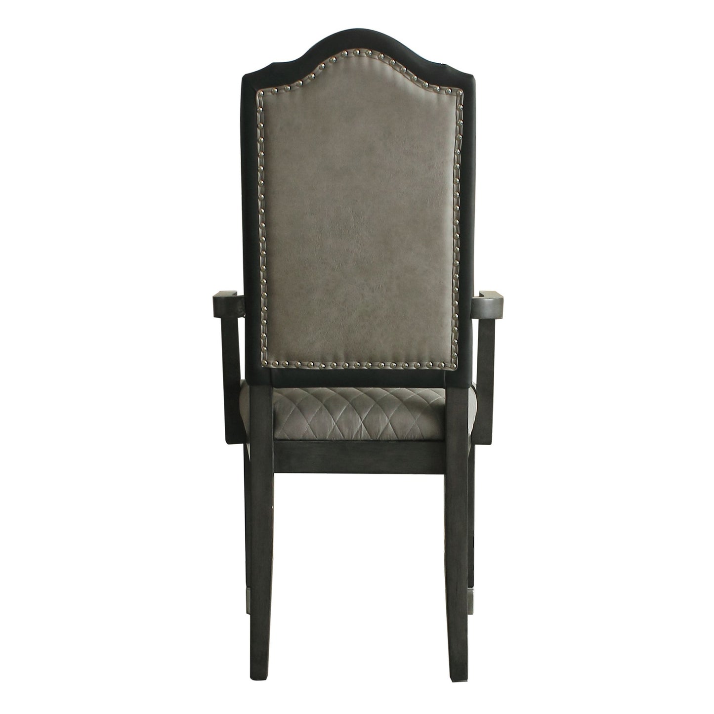 Dark grey tufted upholstered dining chair with nailhead trim and dark wood frame