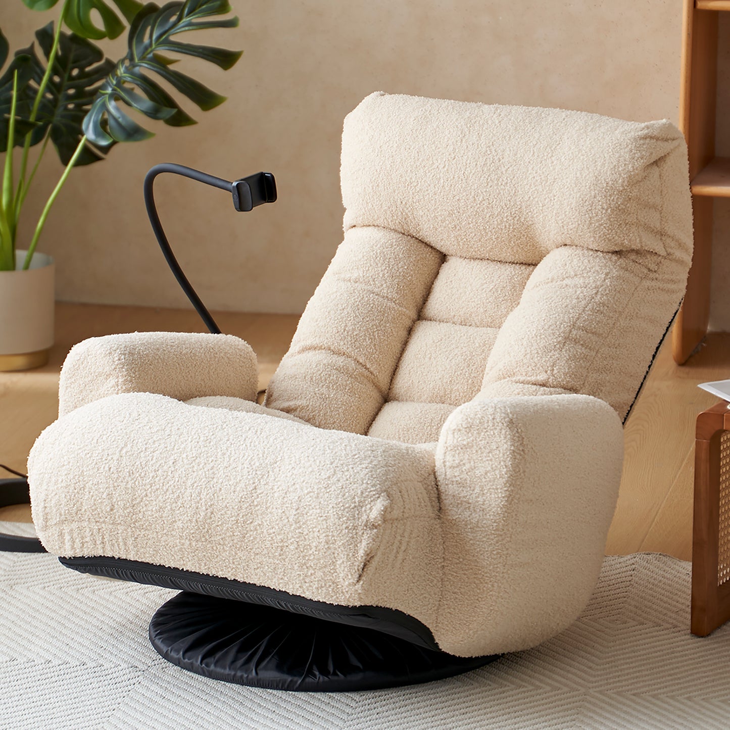Plush cream boucle swivel chair with tufted back and wide arms perfect for a cozy reading nook