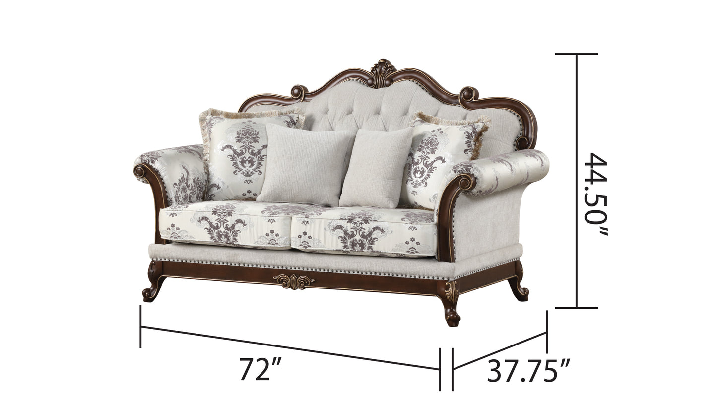 Ornate damask loveseat sofa with tufted back ornate wood trim and decorative pillows