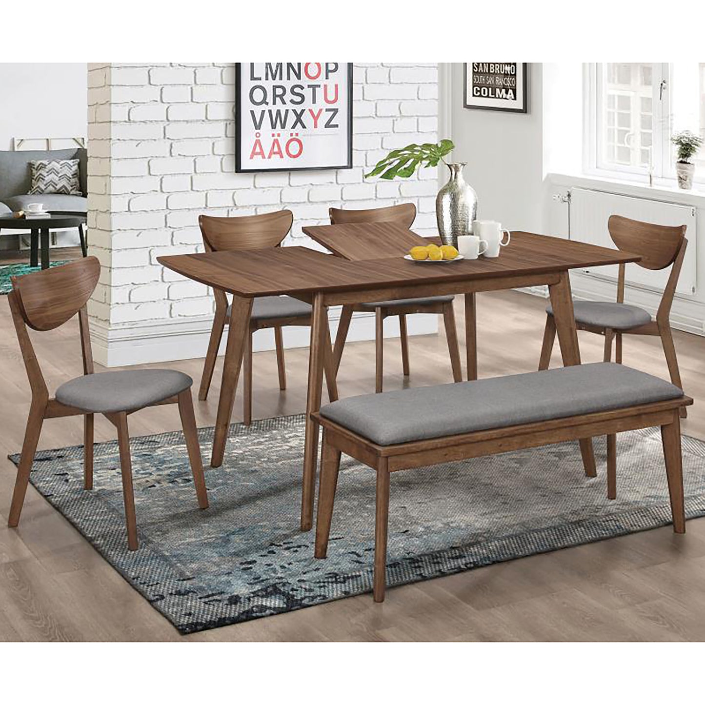 Midcentury modern dining set with walnut wood table and four chairs