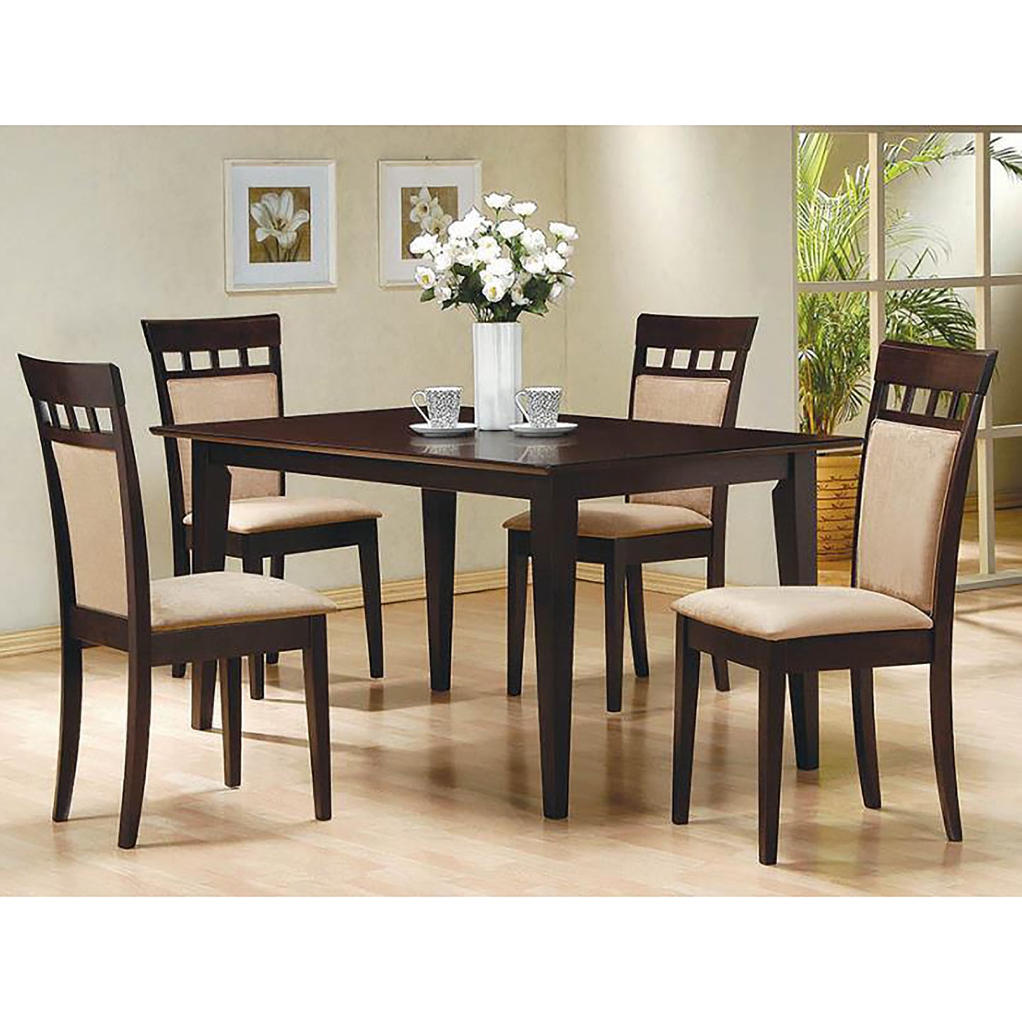 Dark brown wooden dining table with four upholstered chairs featuring slatted backs