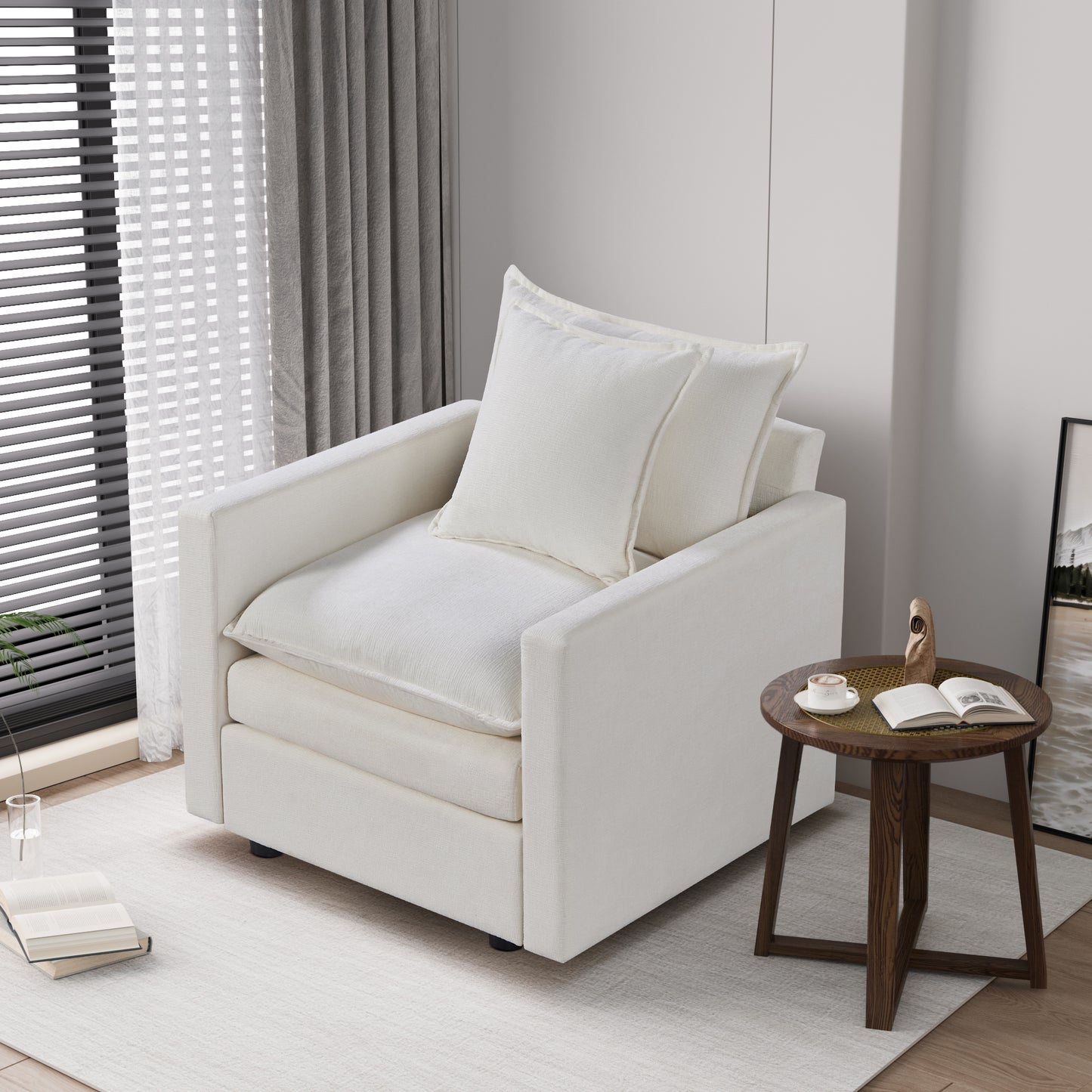 Plush white linen armchair with two matching throw pillows perfect for a cozy reading nook