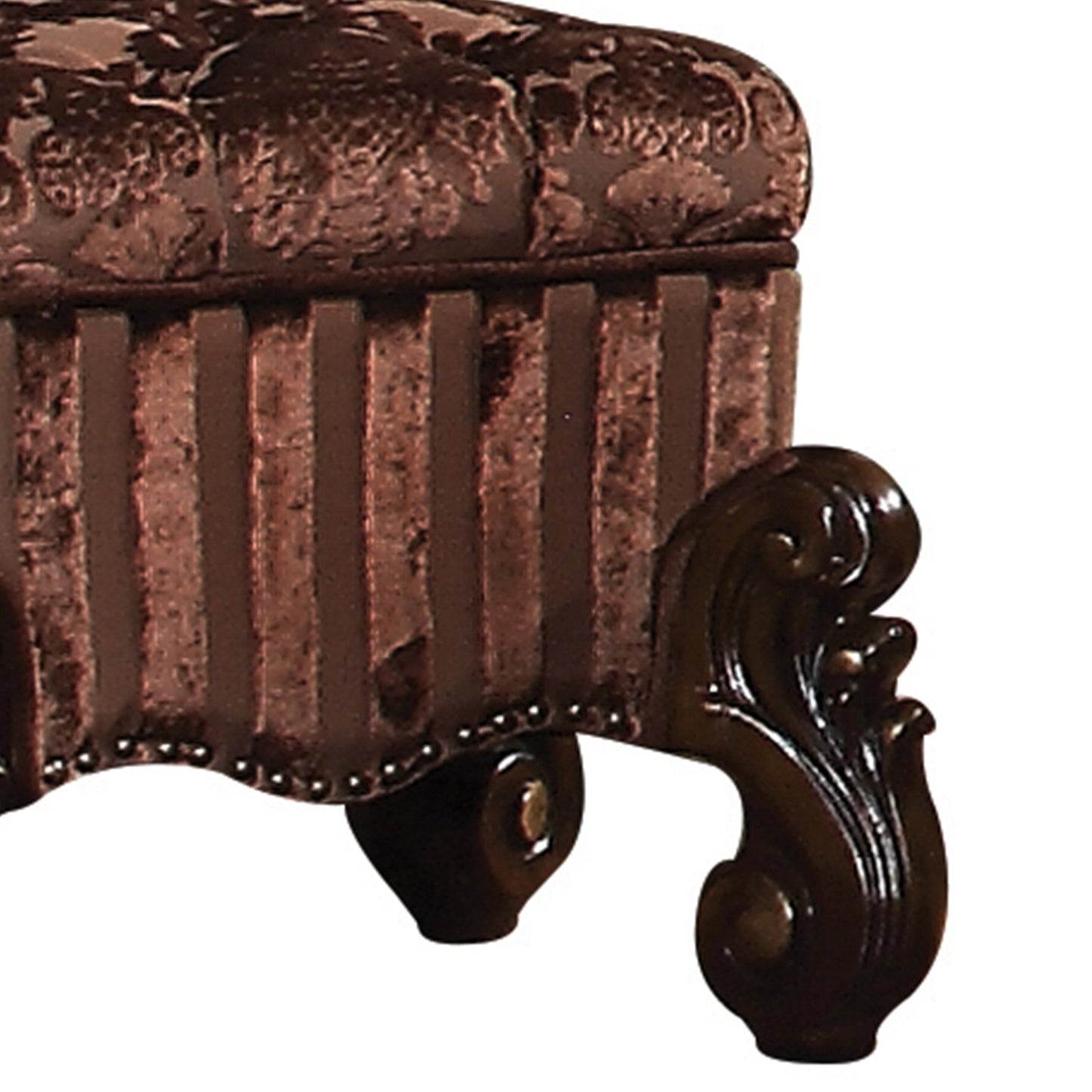Brown velvet storage ottoman with ornate carved wooden leg tufted top and striped sides