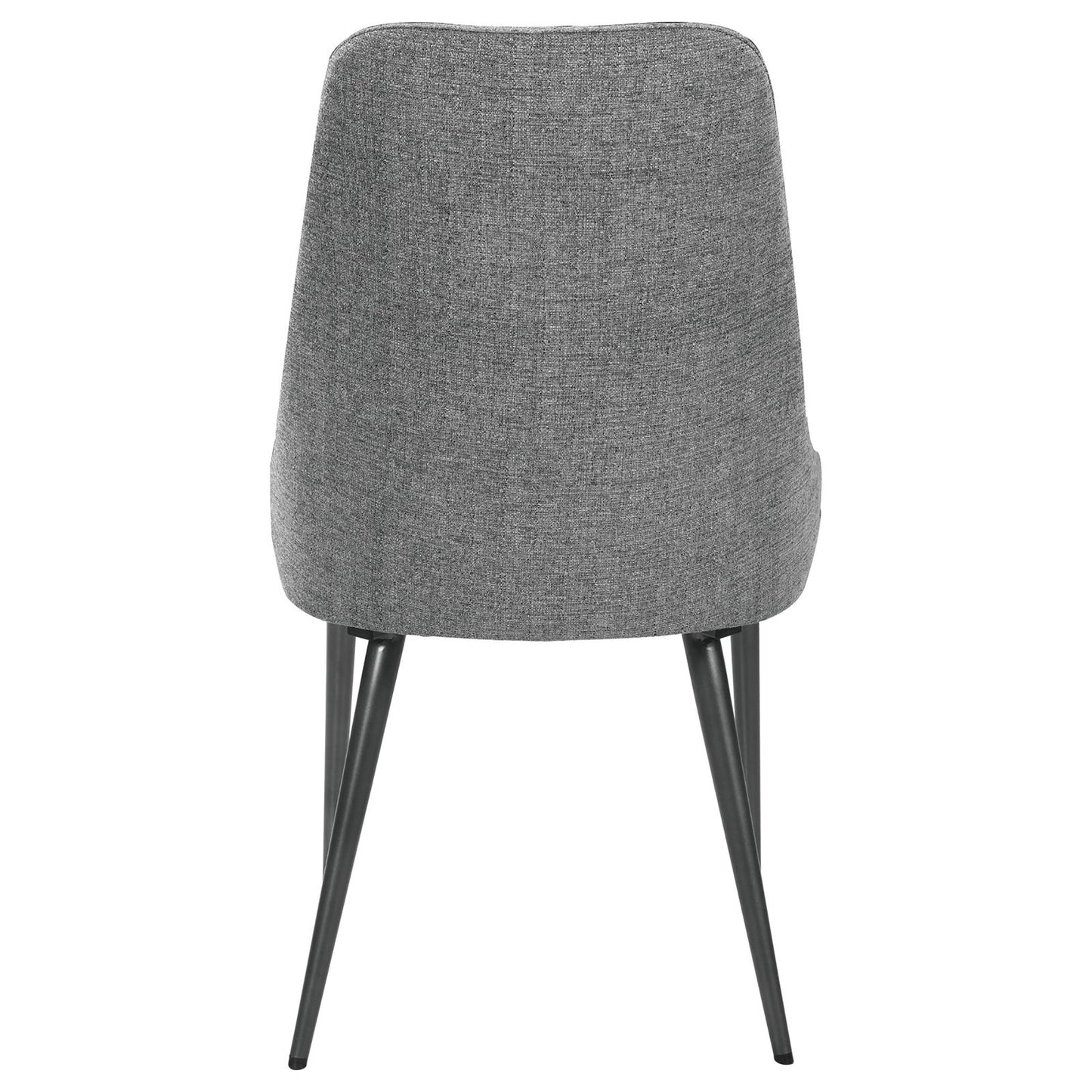 Back view of a grey fabric upholstered dining chair with tapered metal legs