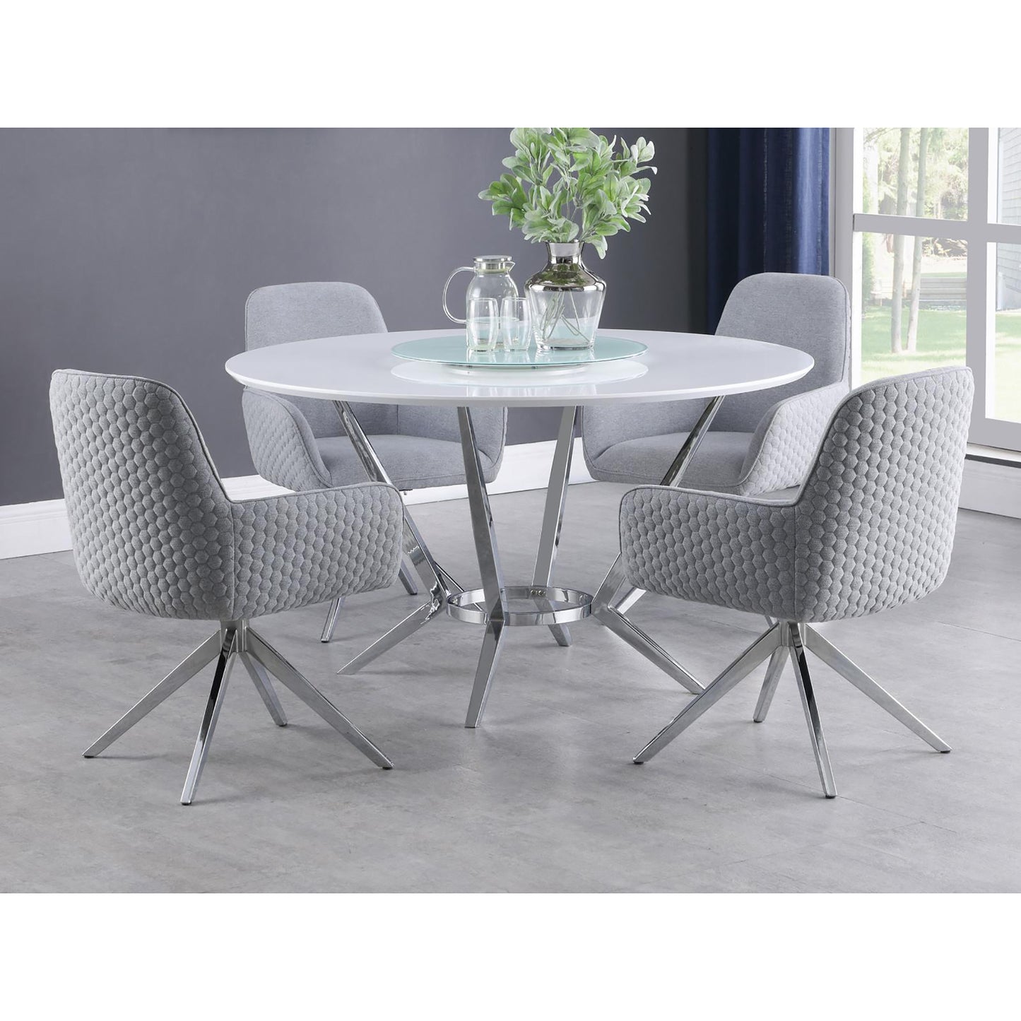 Modern gray upholstered dining chairs with textured honeycomb pattern and chrome swivel base