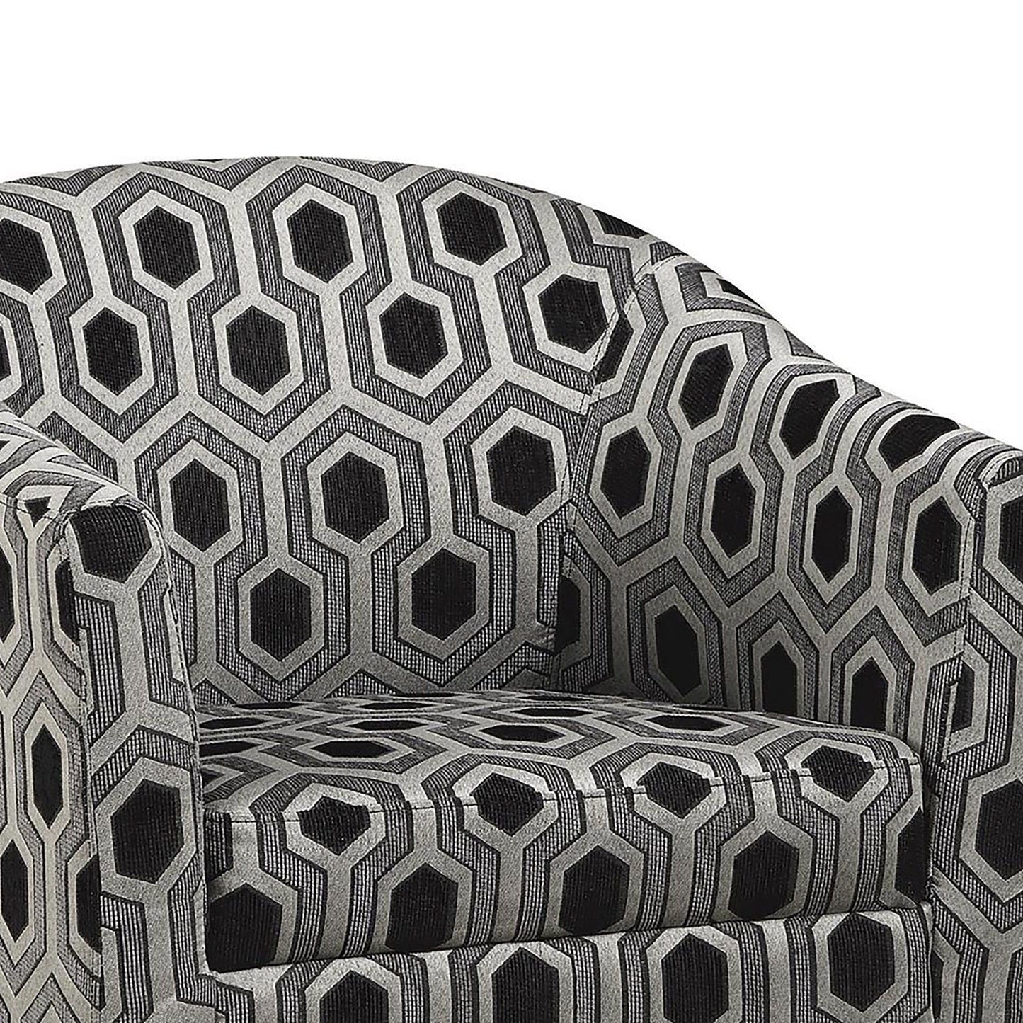 Closeup of a modern barrel chair upholstered in geometric black and grey fabric