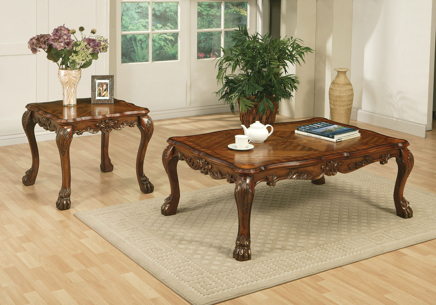 Ornate dark wood coffee table with carved legs perfect for living room decor