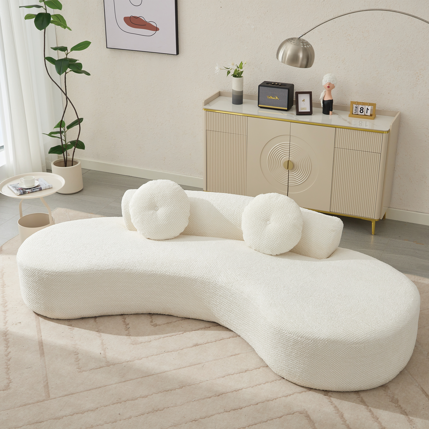 Curved boucle sofa in cream with round back cushions perfect for a modern living room