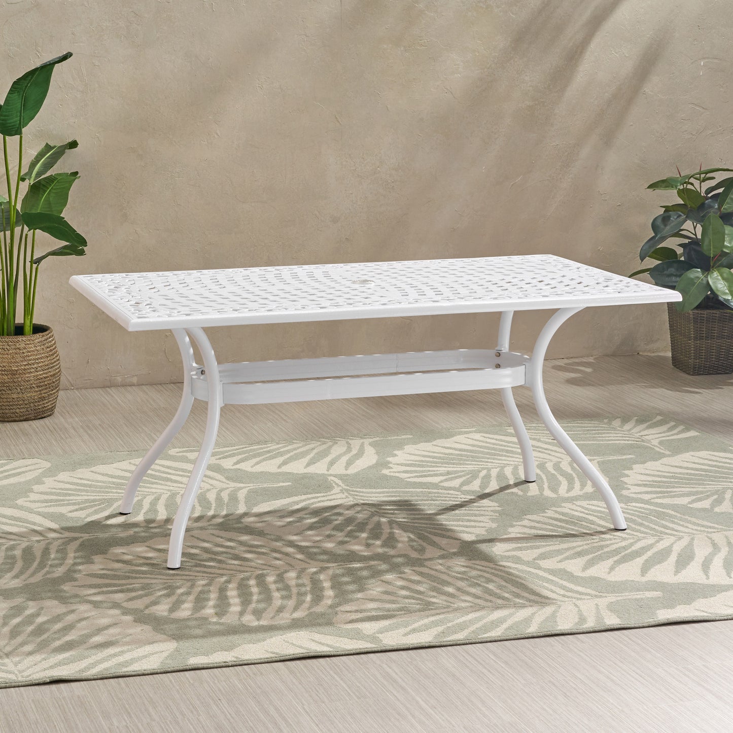 White metal rectangular outdoor dining table with ornate lattice top