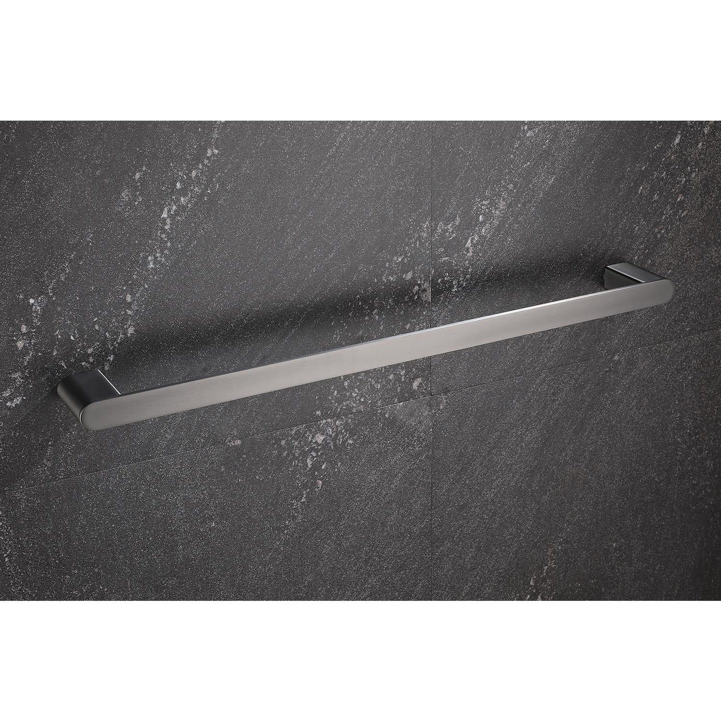 Brushed nickel single towel bar mounted on textured dark gray tile