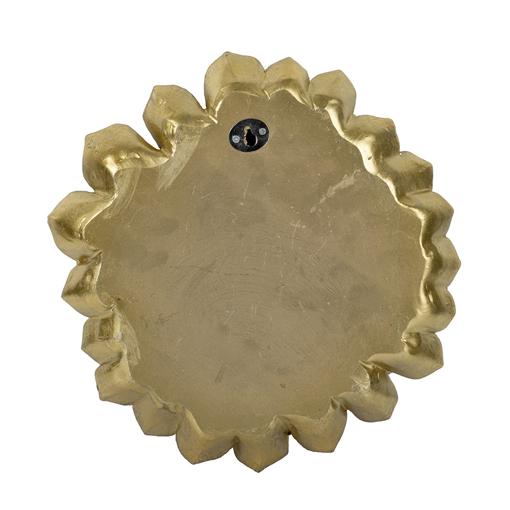 Gold sunburst wall decor with ornate frame and hanging hook on reverse