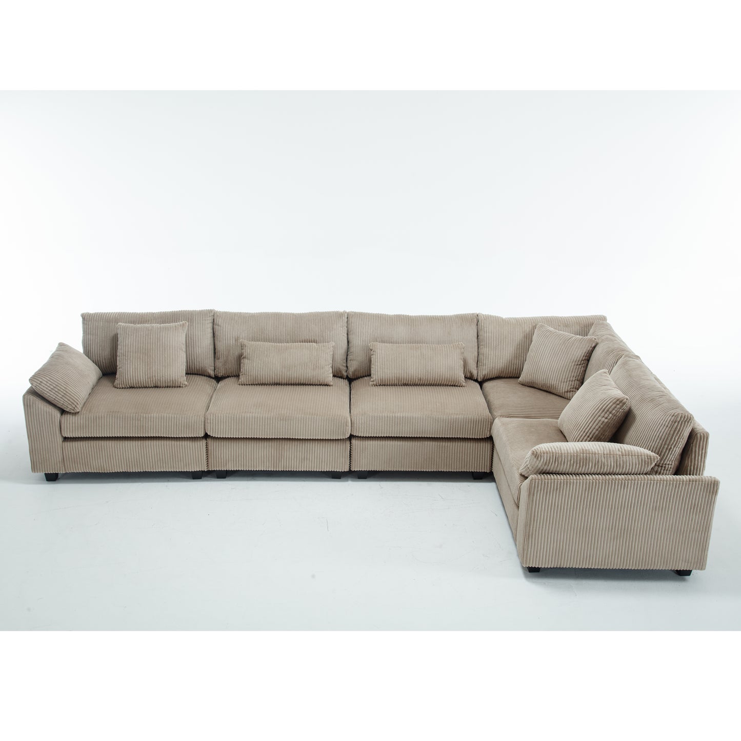 Beige corduroy sectional sofa with multiple cushions on a white background