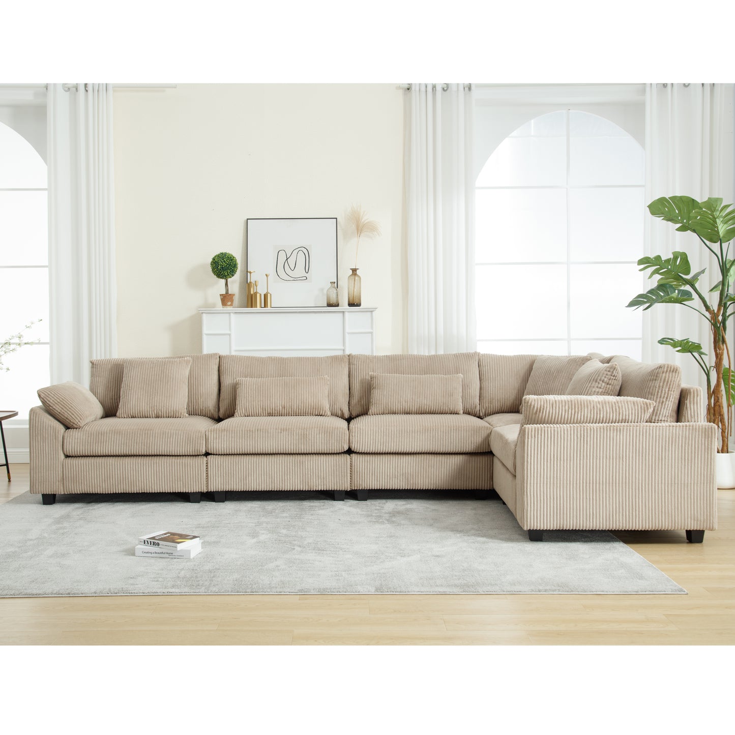 Beige corduroy sectional sofa with plush throw pillows perfect for modern living rooms