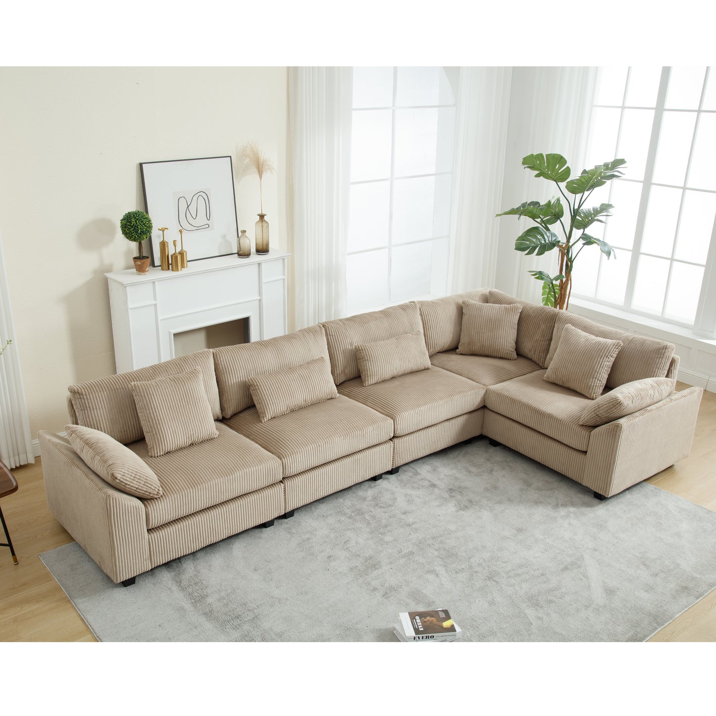 Comfortable tan corduroy sectional sofa with plush throw pillows for a modern living room
