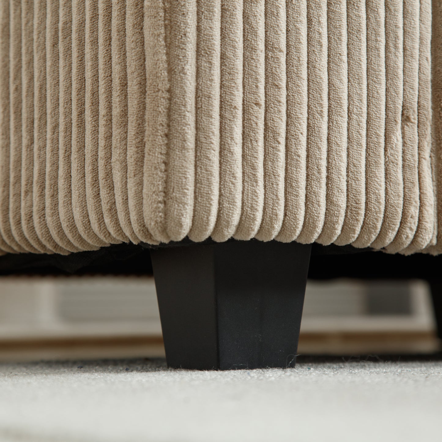 Beige corduroy sofa base with black square leg for modern living room