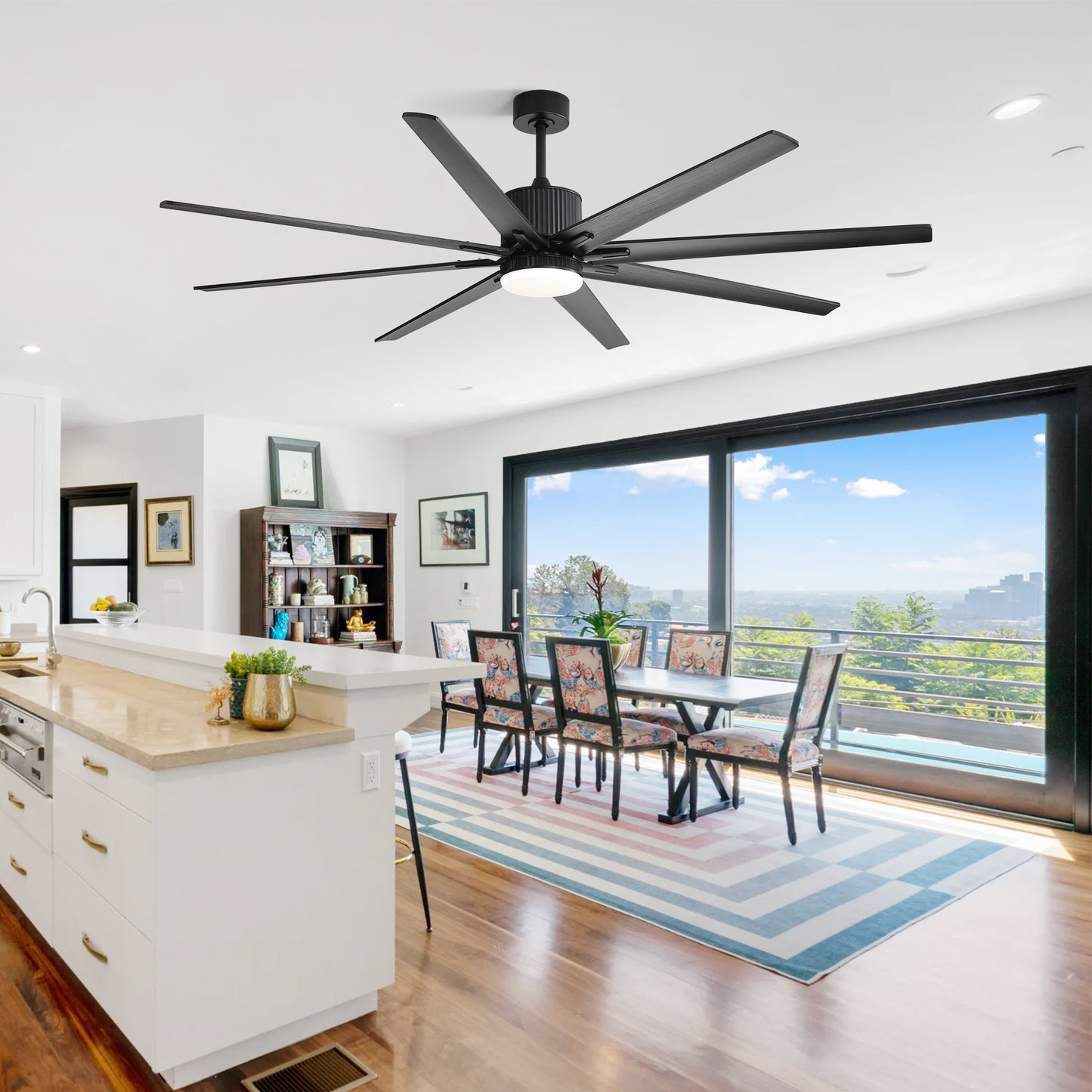 Modern black blade ceiling fan with integrated LED light perfect for spacious living areas