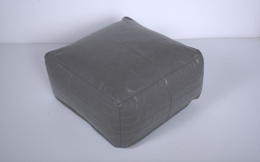 Square grey faux leather pouf with stitched detailing for versatile seating