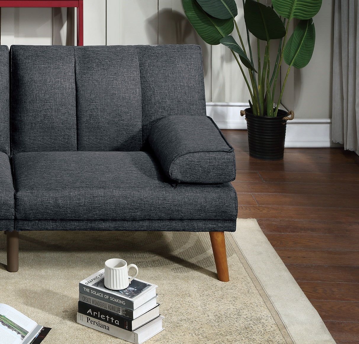 Dark gray tufted fabric sofa with wooden legs comfortable modern seating