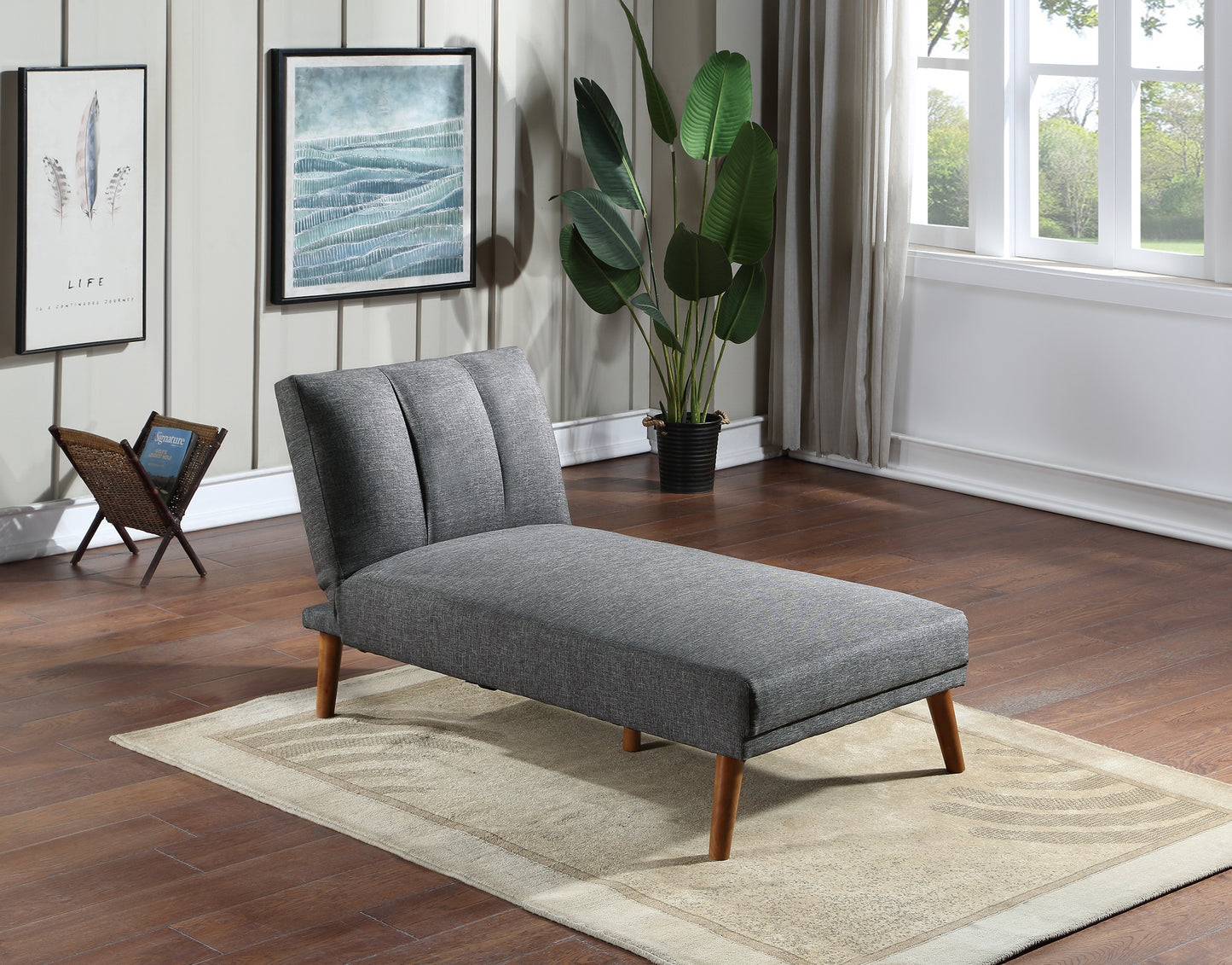 Grey fabric chaise lounge with tufted backrest and wooden legs