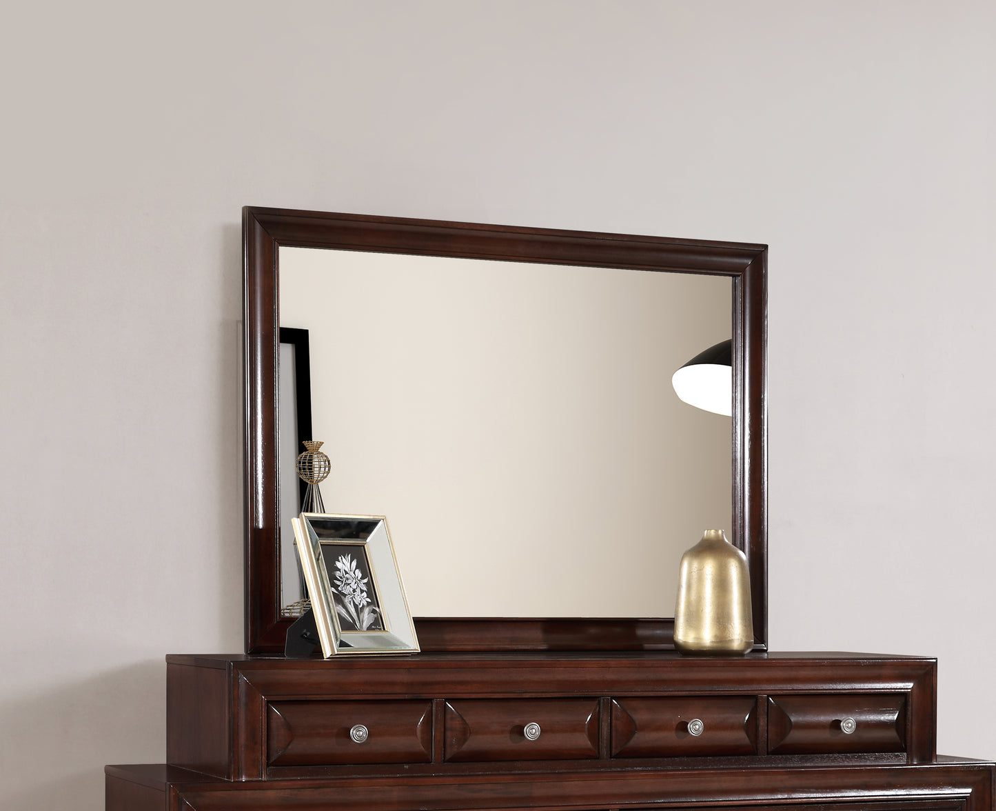 Dark brown wood dresser mirror with decorative drawer fronts