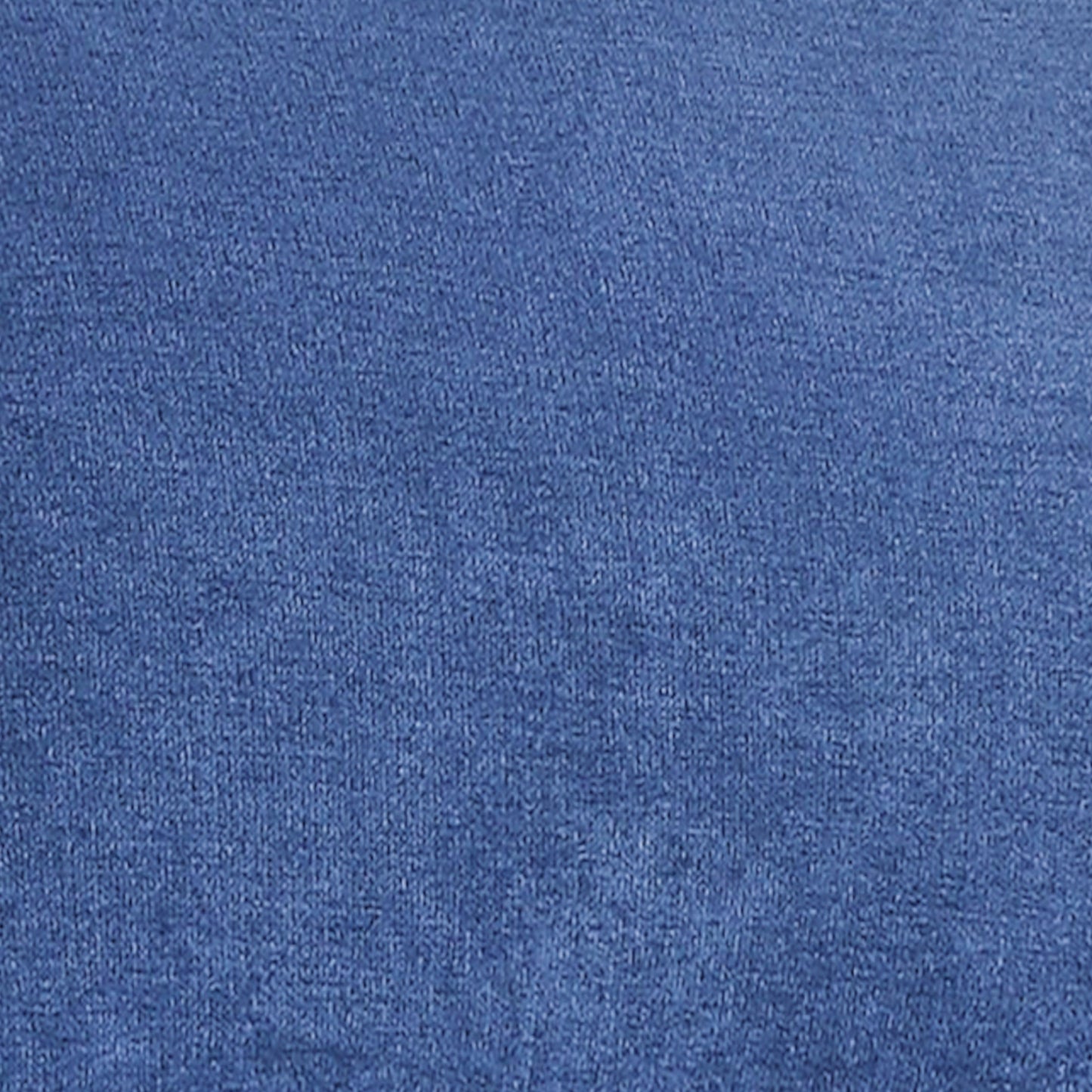 Closeup of a textured denim fabric in a classic blue wash