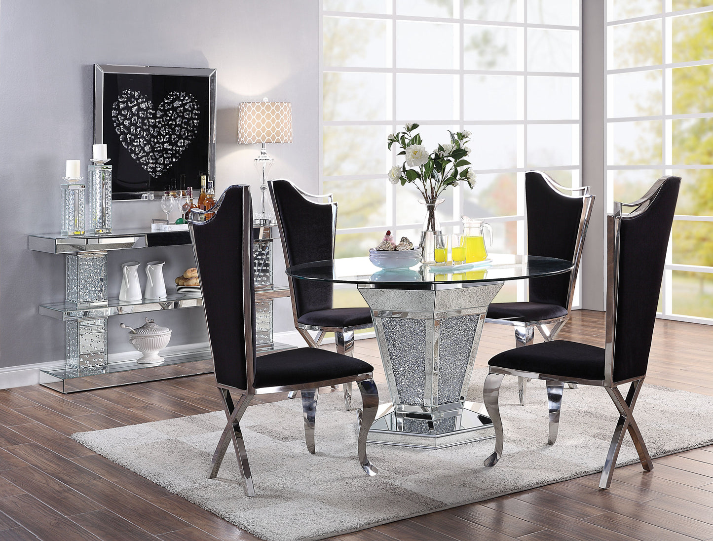 Glam dining set with glass top table and black velvet chairs