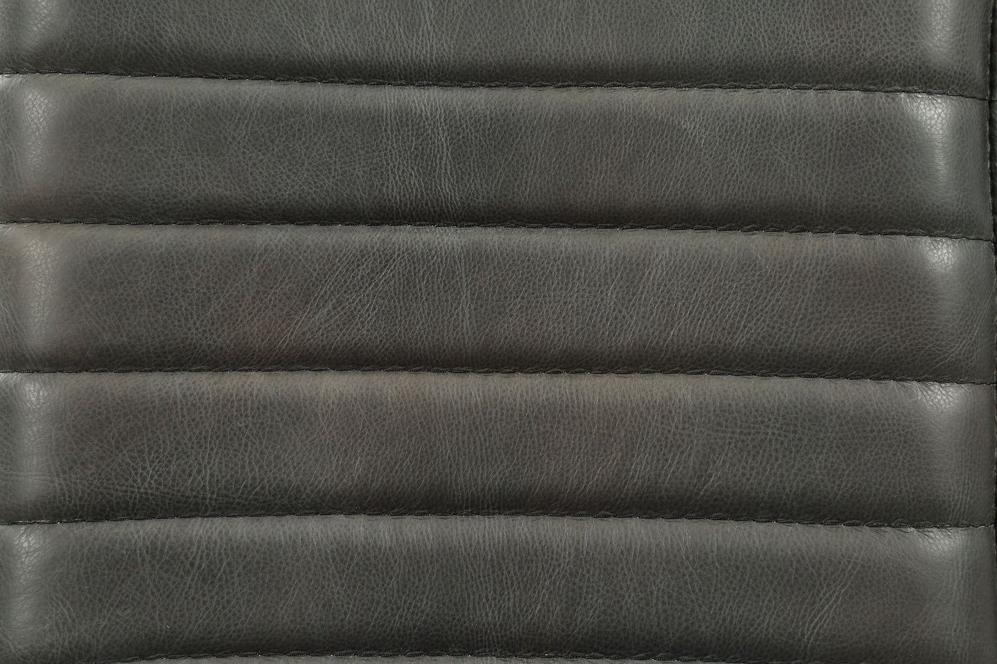 Dark grey stitched faux leather upholstery detail