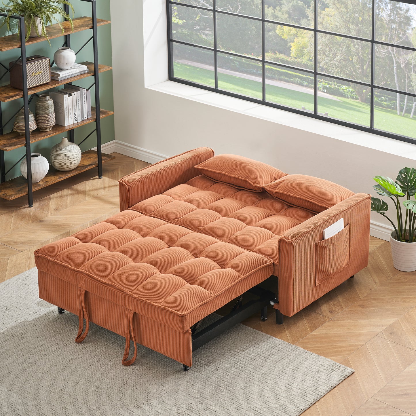 Orange corduroy sofa bed with tufted cushions offering comfortable seating and sleeping