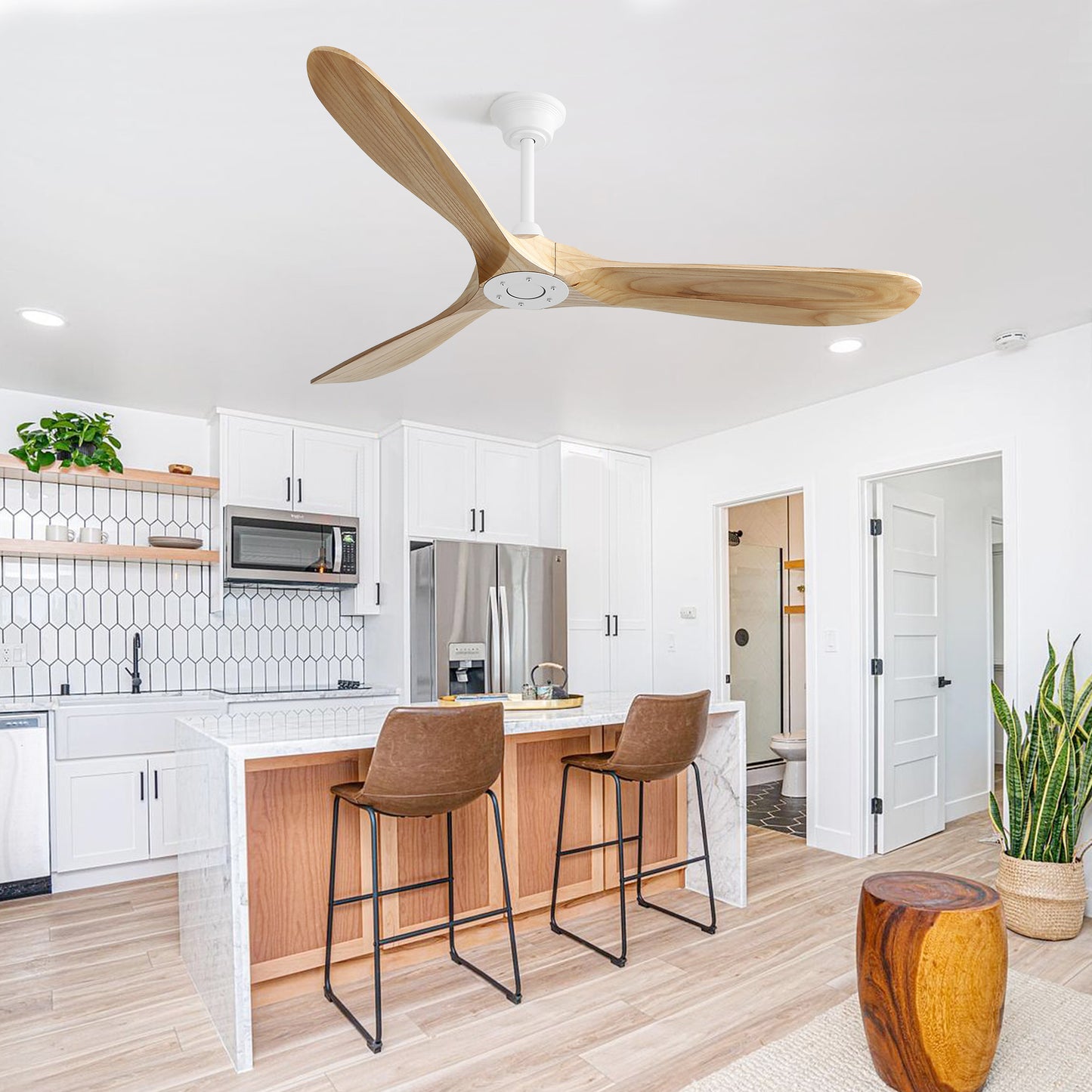 Modern wooden threeblade ceiling fan with natural finish complementing a contemporary kitchen island setting
