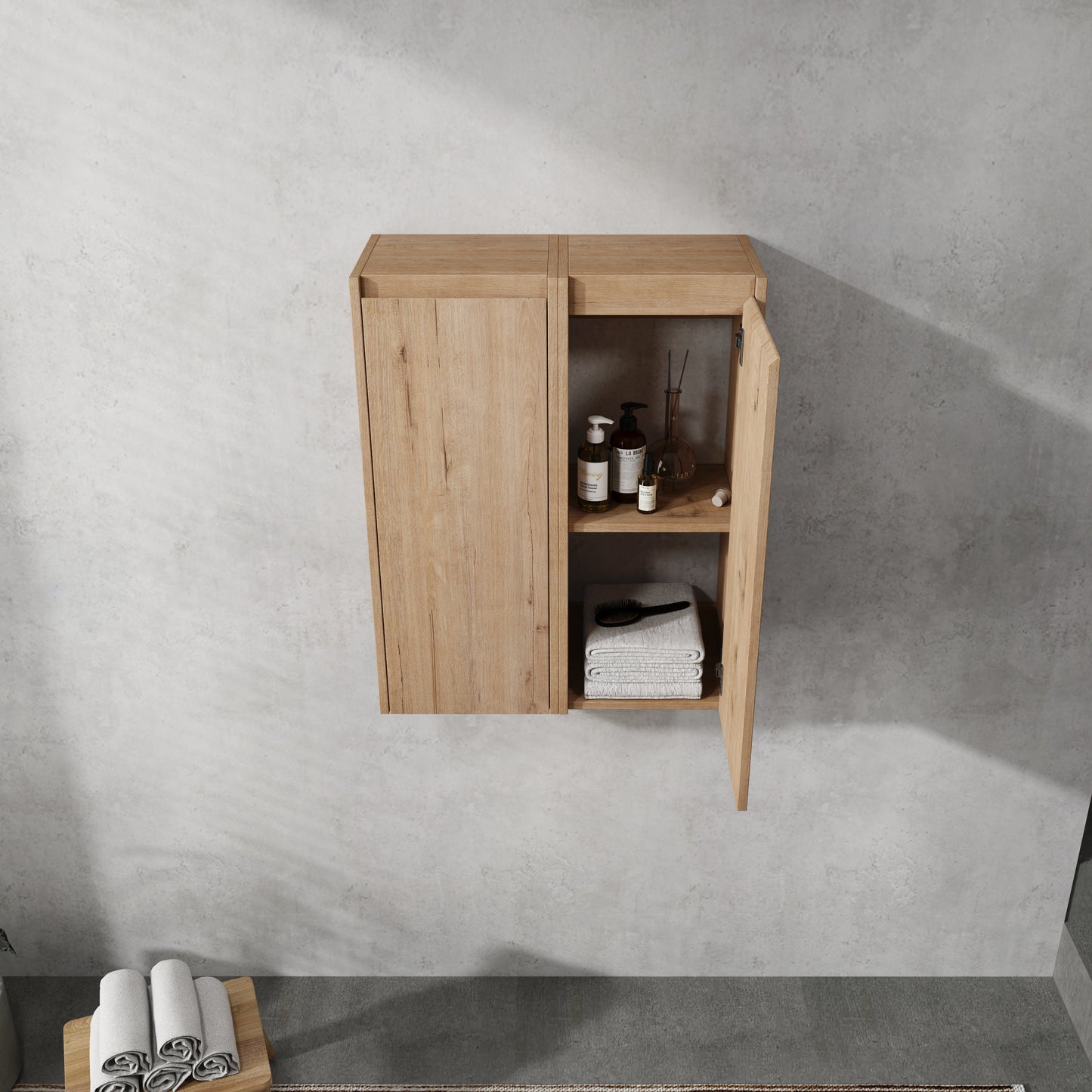 Modern light wood bathroom cabinet with open shelving displaying toiletries and stacked towels
