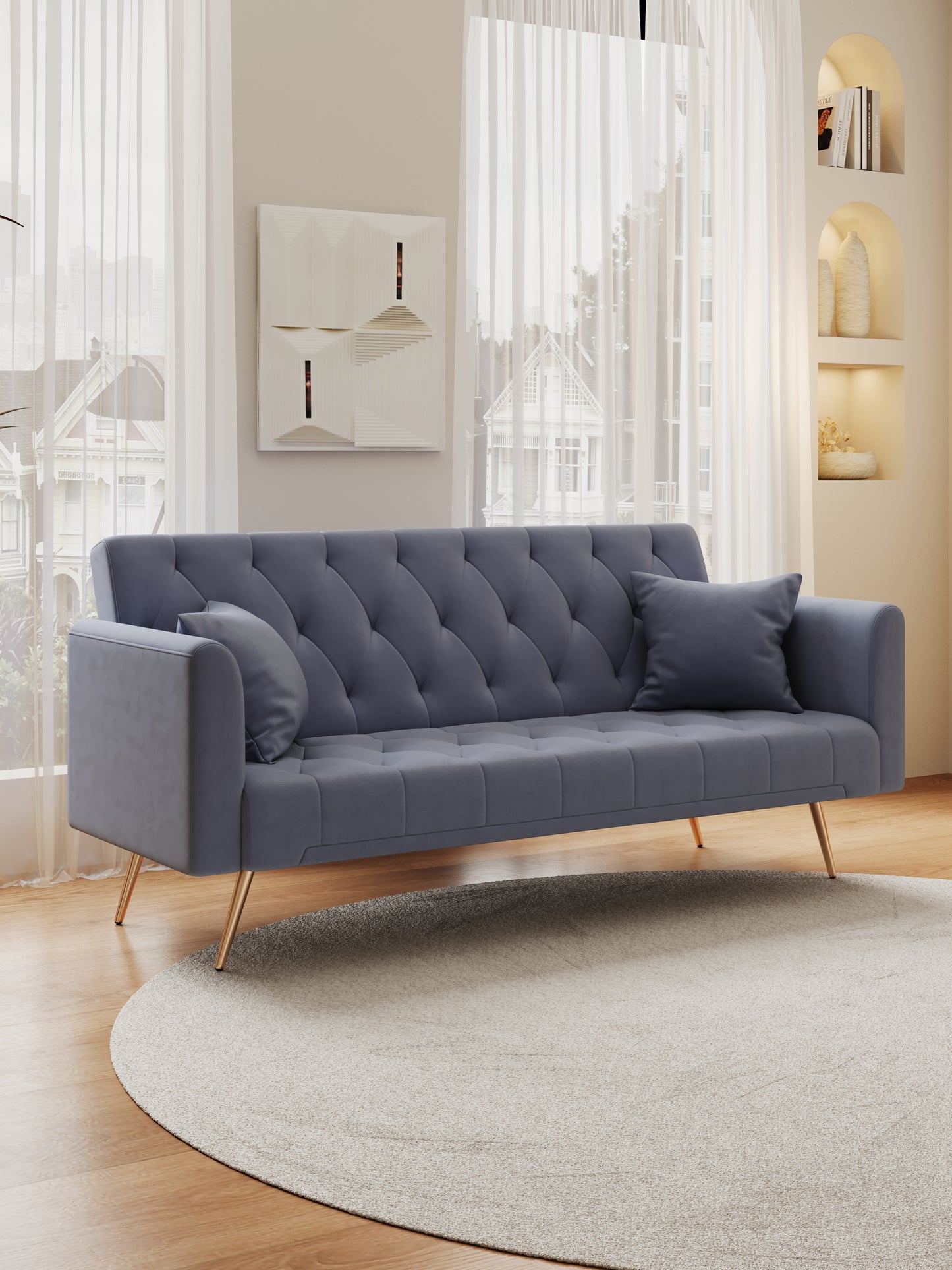 Tufted grey velvet sofa with gold legs perfect for modern living rooms