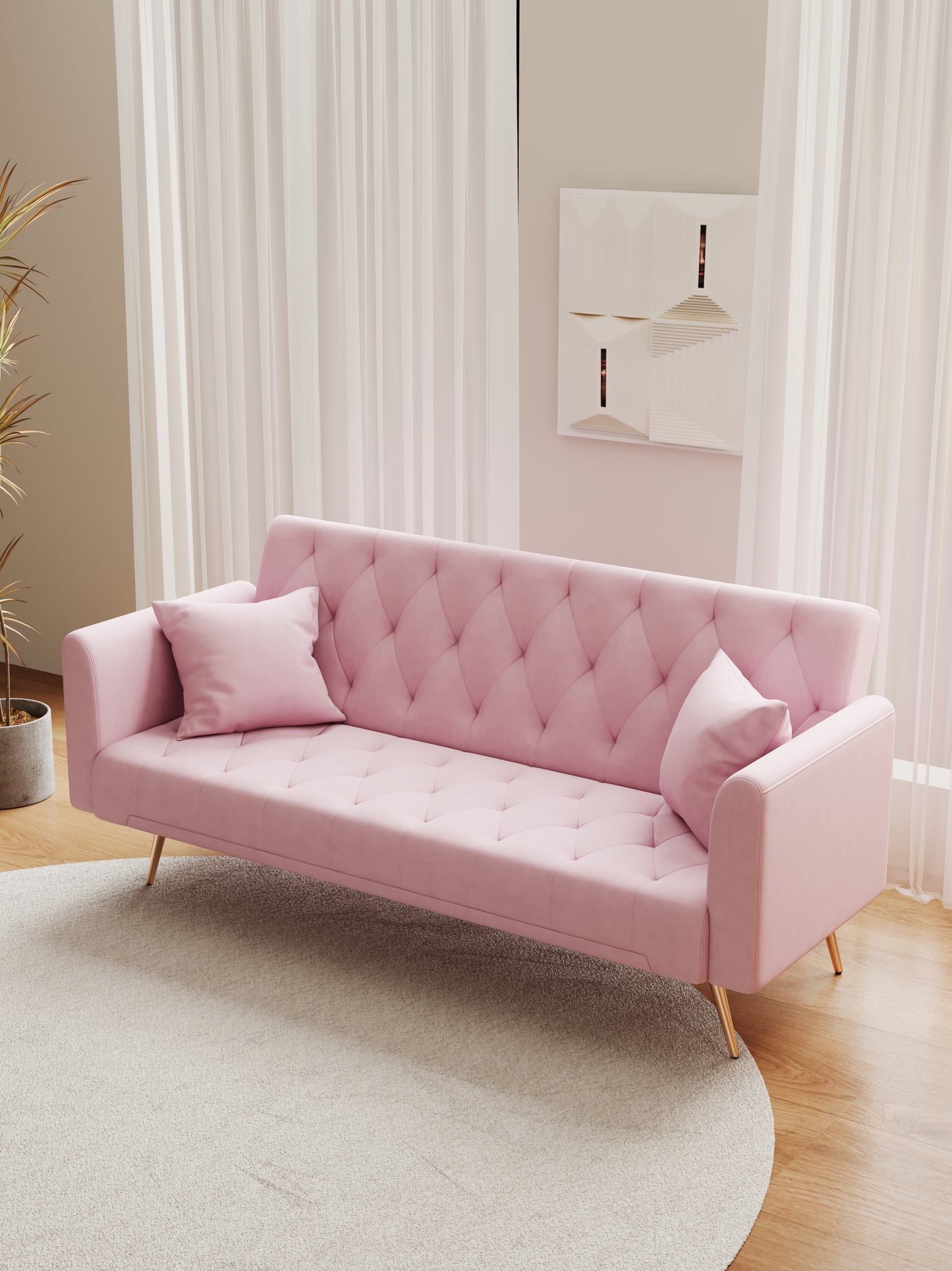 Pink velvet sofa with tufted detailing and gold legs perfect for a living room
