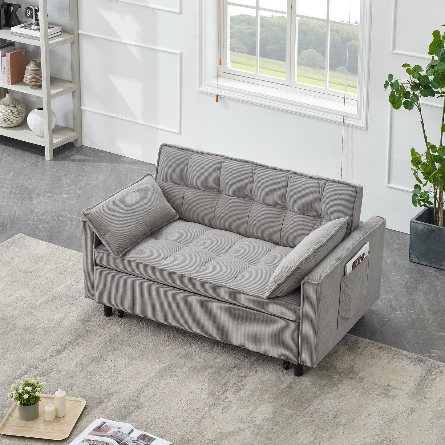 Grey corduroy sofa with tufted cushions and side pocket ideal for small spaces